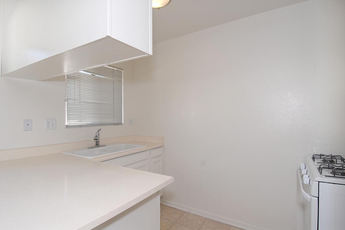 a white sink in a small room