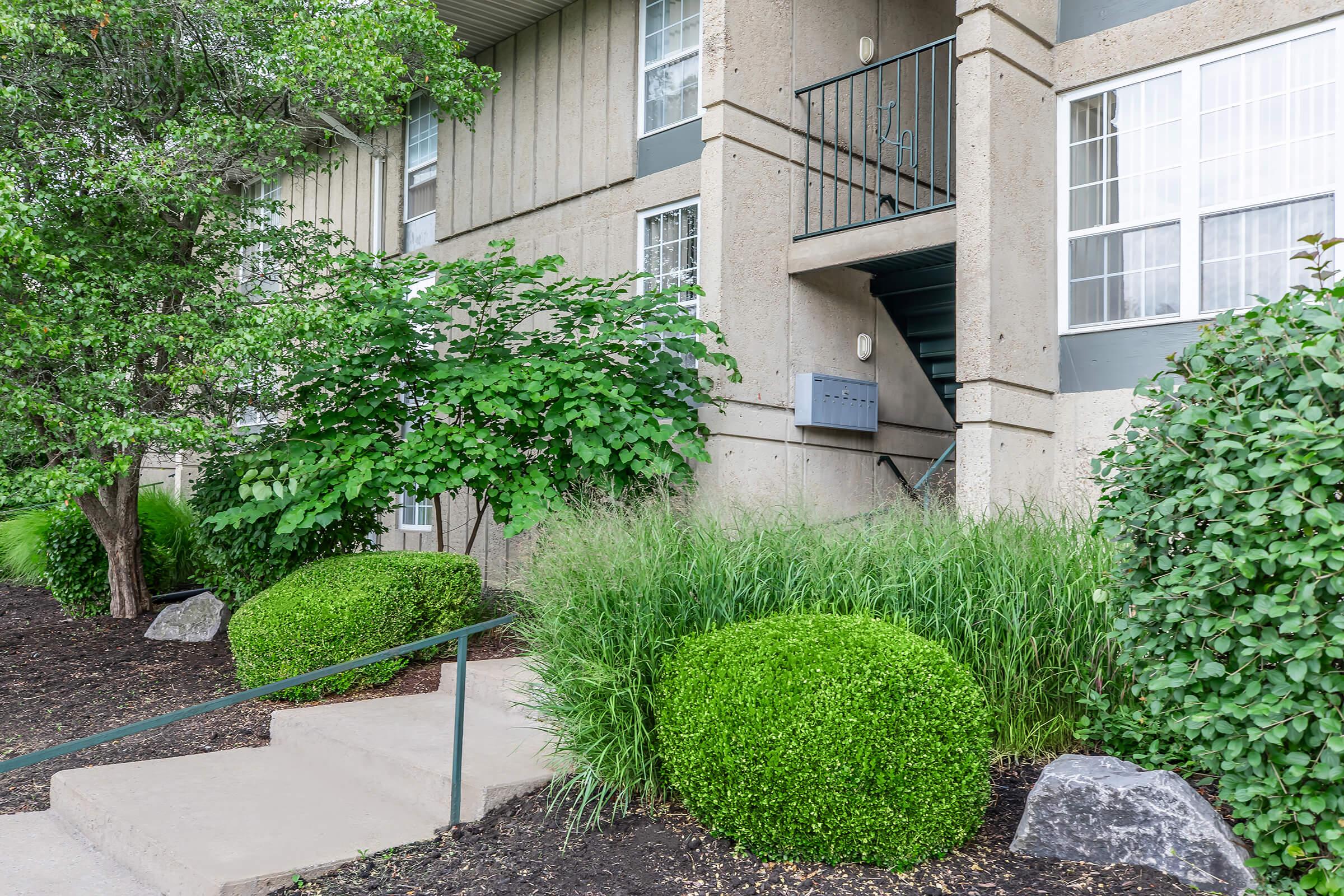 a garden in front of a building