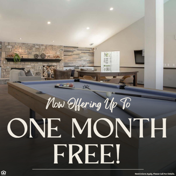 Image of apartment clubhouse with a pool table. Now offering up to one month free! Restrictions apply, please call for details.