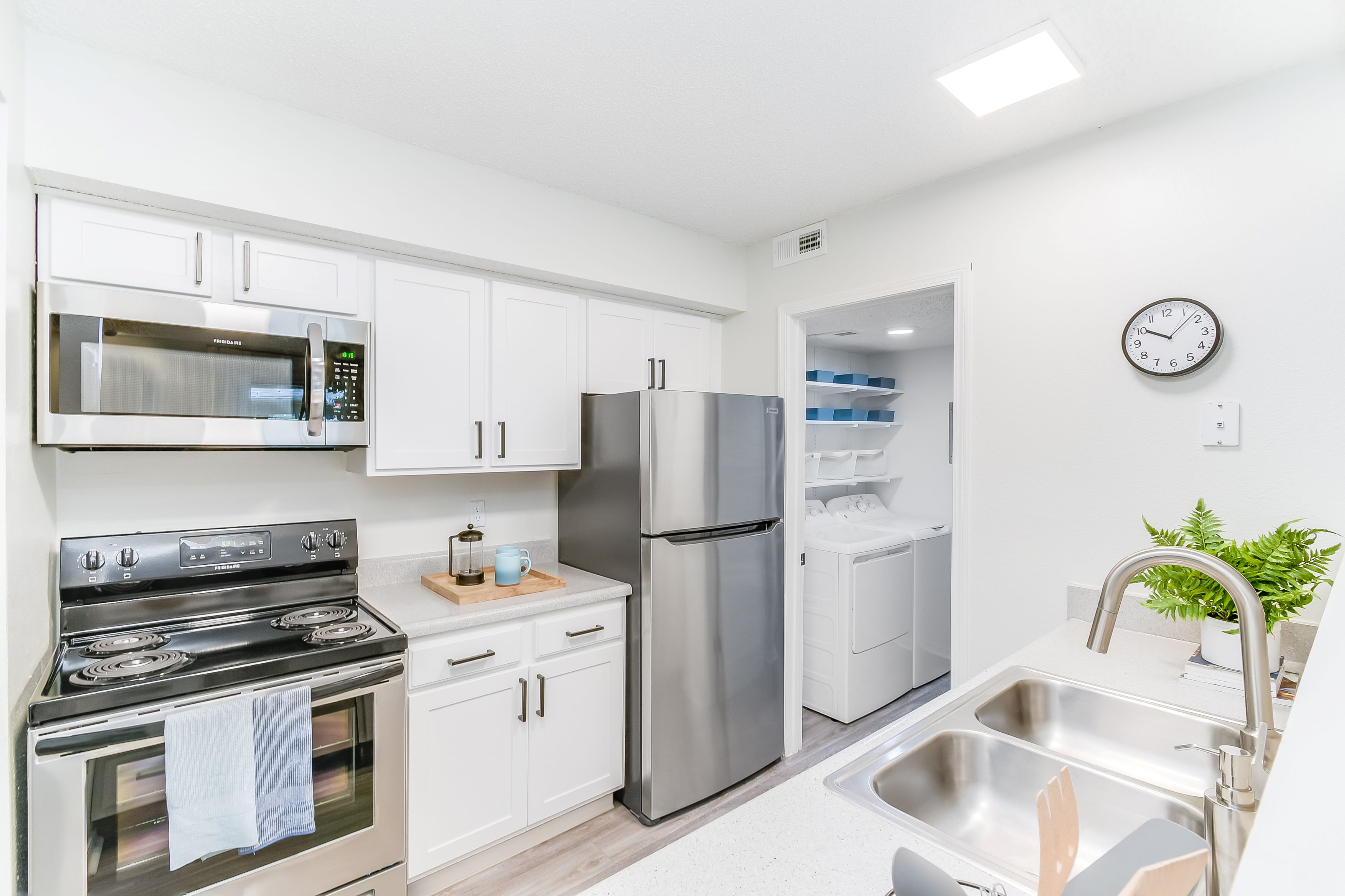 A kitchen with stainless steel appliances at Dylan Apartments in Kansas City, KS