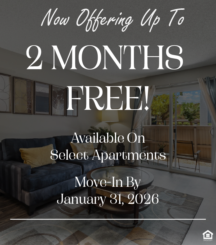 A cozy living room featuring a dark sofa with yellow cushions, a glass coffee table on a patterned rug, and a lamp. The text on the image says, "Now Offering Up To 2 Months Free! Available on Select Apartments. Move-In By January 31, 2026."