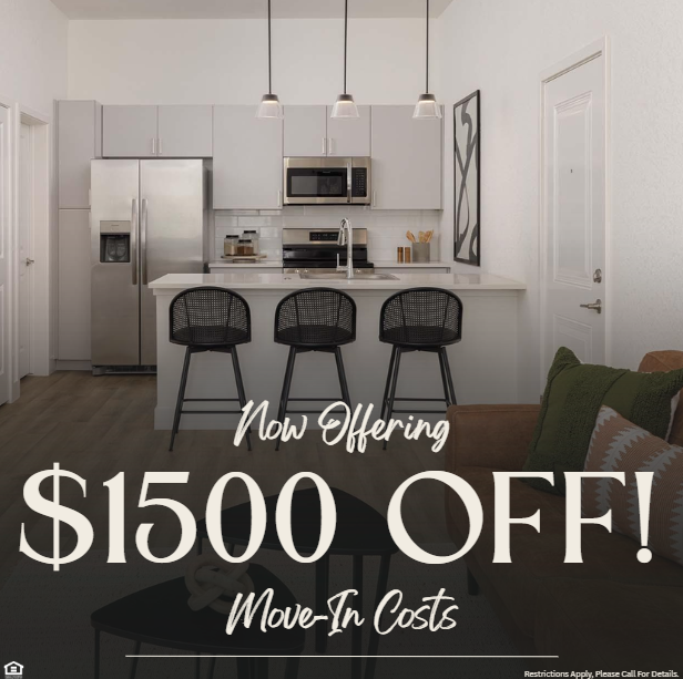 A photo of an apartment kitchen with stainless steel appliances and grey cabinets. Now offering $1500 off move-in costs. Restrictions apply, please call for details.