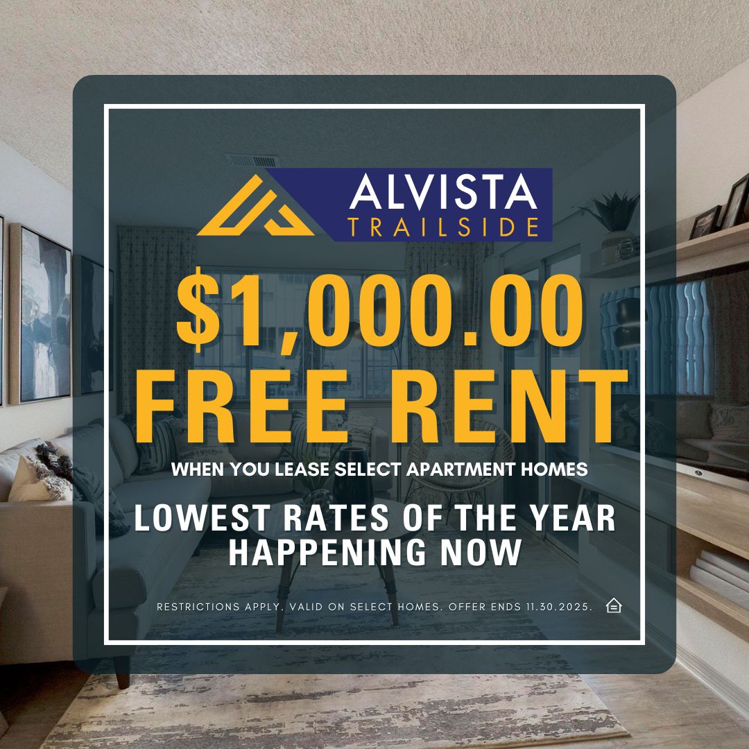 Promotional graphic for Alvista Trailside apartments featuring a modern living room background. The text overlay reads “$1,000.00 Free Rent when you lease select apartment homes. Lowest rates of the year happening now.” Additional fine print states “Restrictions apply. Valid on select homes. Offer ends 11.30.2025.”