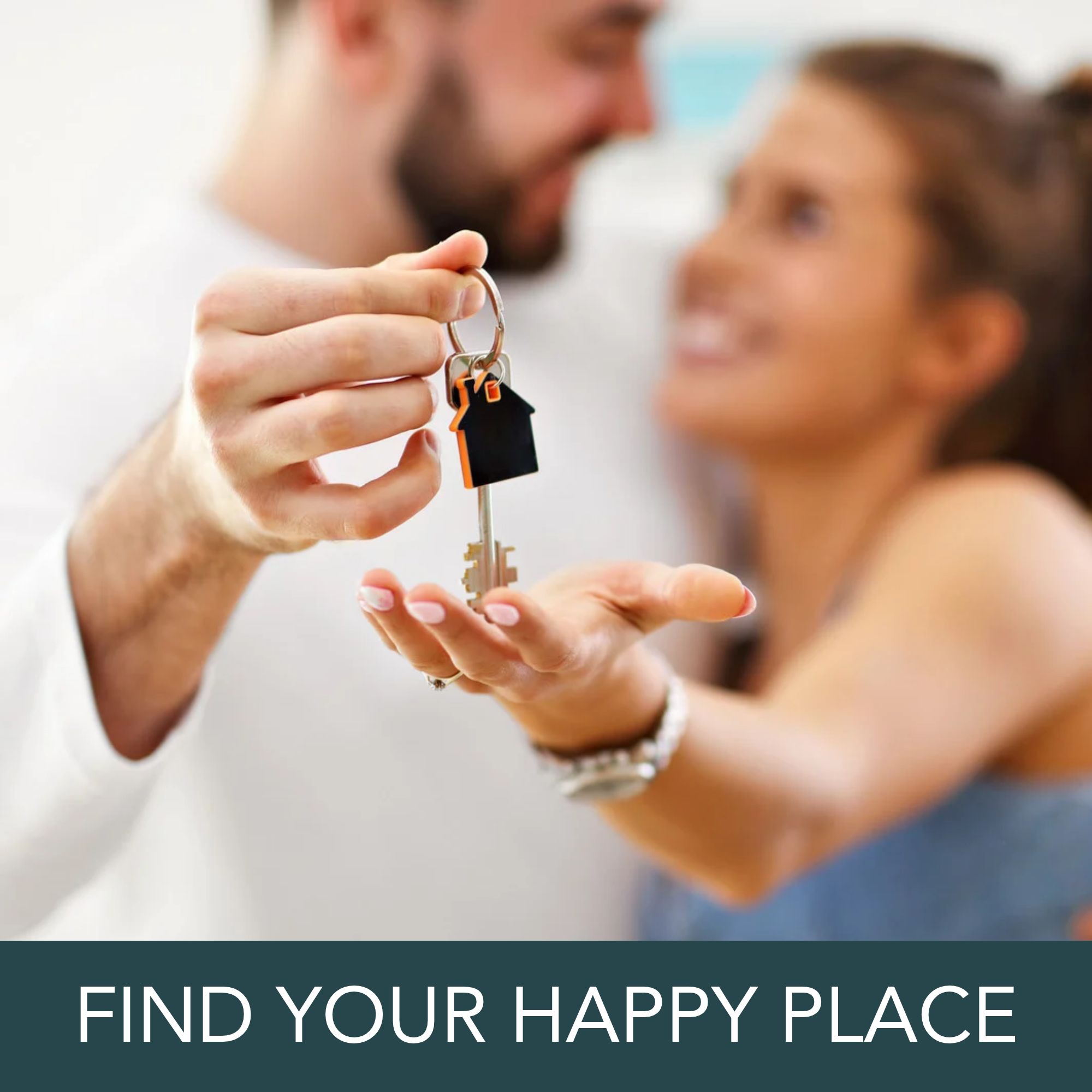 Man holding apartment keys in the foreground while a smiling woman stands beside him, with “Find Your Happy Place” displayed below.