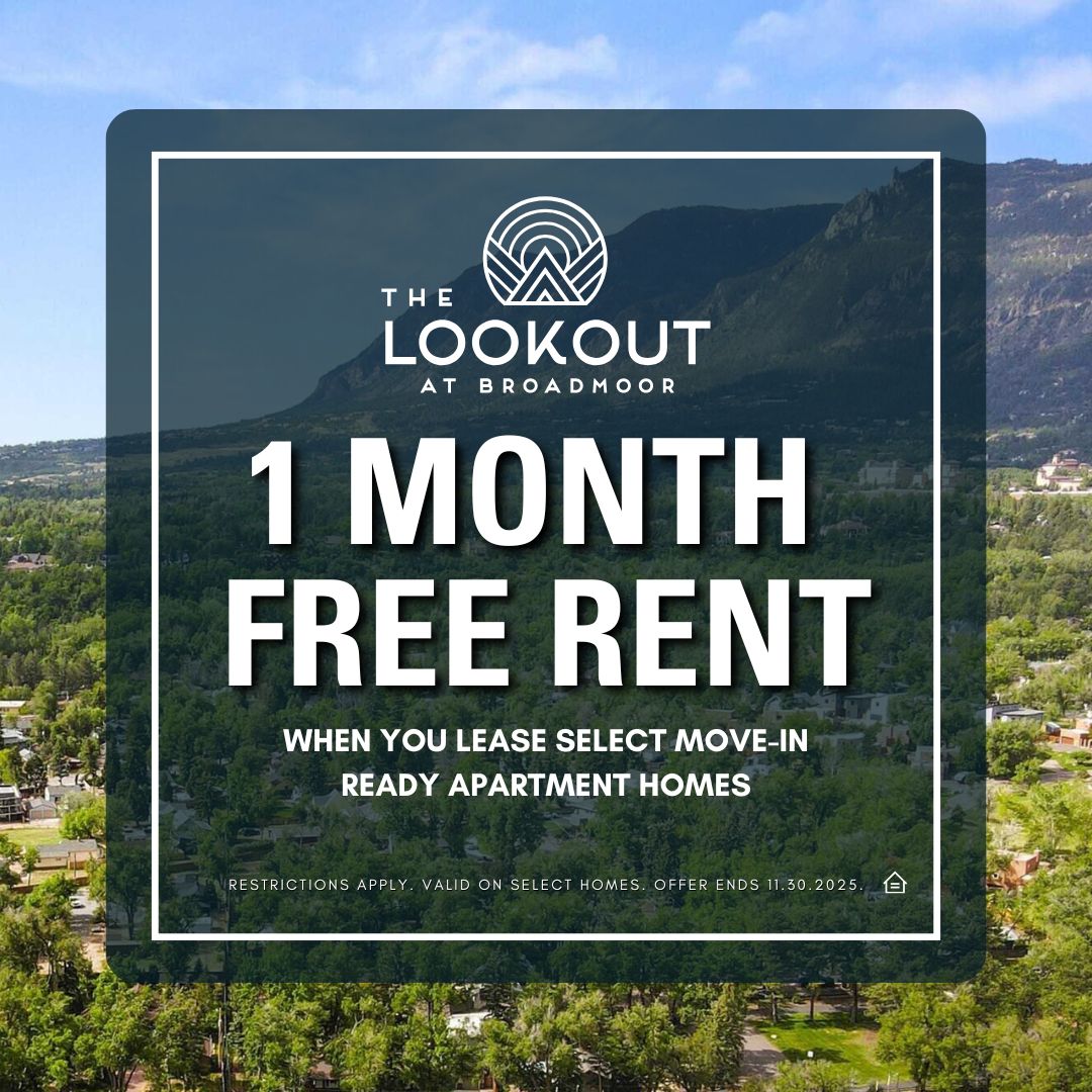 Promotional graphic for The Lookout at Broadmoor offering one month free rent when leasing select move-in-ready apartment homes. The background shows a scenic mountain view surrounded by trees and residential buildings.