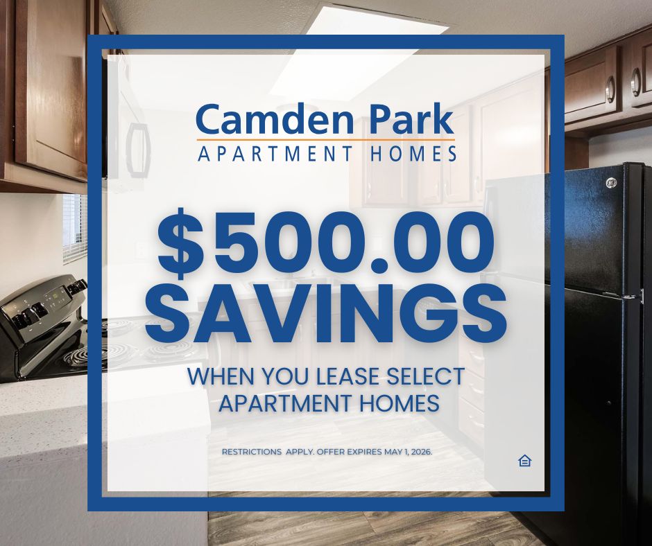 A website pop-up graphic for Camden Park Apartment Homes features a blue-bordered white overlay. Large blue text prominently states "$500.00 SAVINGS" above smaller text, "WHEN YOU LEASE SELECT APARTMENT HOMES." The community logo is at the top, and the background shows a partial view of a kitchen.