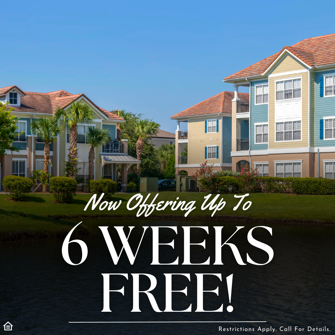 An image of a blue and yellow apartment community exterior with orange shingle roofing and nearby palm trees and grass with a pond. The text says "Now offering up to 6 weeks free! Restrictions apply. Call for details."