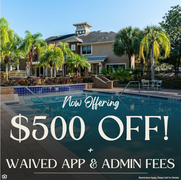Photo of an apartment pool with palm trees and seating. Now offering $500 off plus waived app and admin fees. Restrictions apply, please call for details.