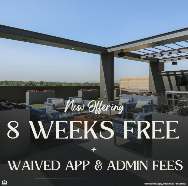 Image of a rooftop lounge with chairs, a fire pit, and lawn games. Now offering 8 weeks free plus waived app and admin fees. Restrictions apply, please call for details.