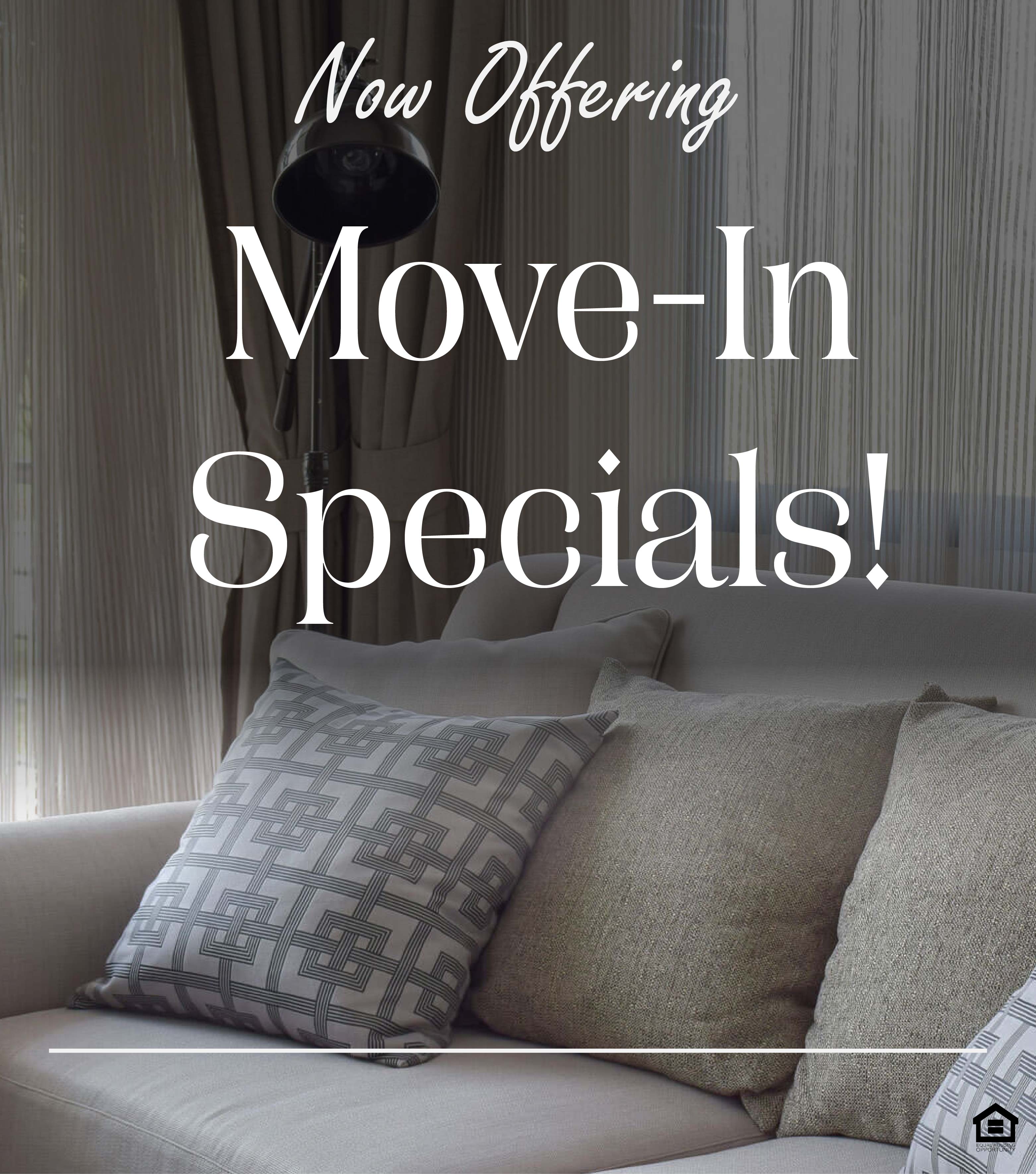 A white couch with decorative pillows situated in front of a large window and a steel lamp. The text on the image says, "Now offering move-in specials!"