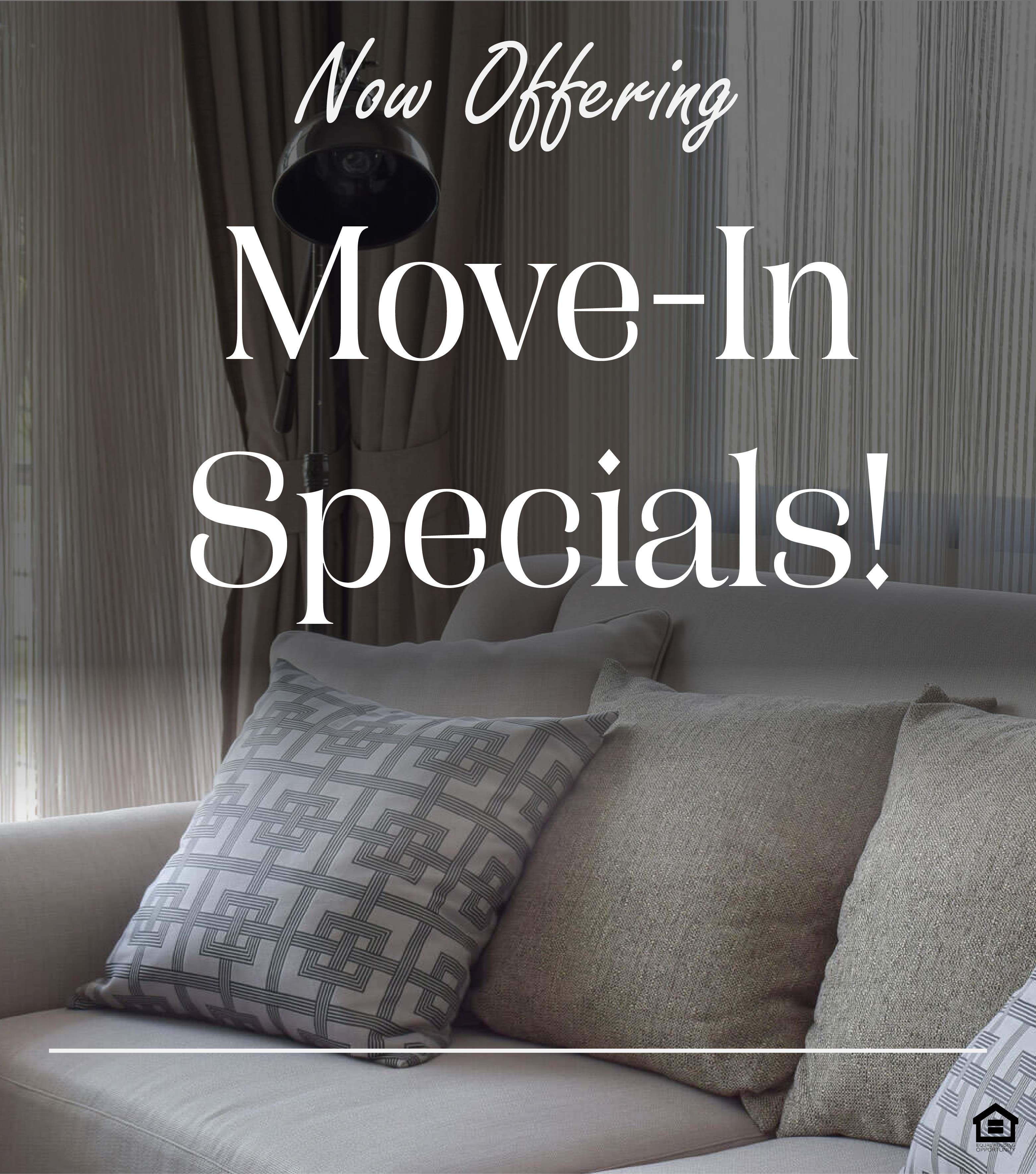 A white couch with decorative pillows situated in front of a large window and a steel lamp. The text on the image says, "Now offering move-in specials!"