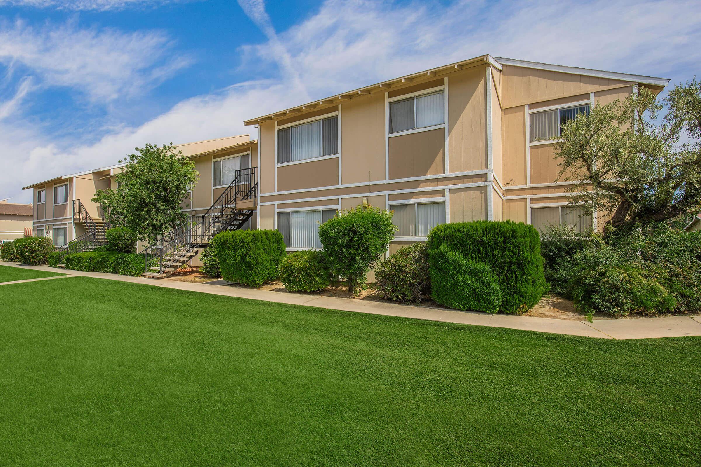 a large lawn in front of a house