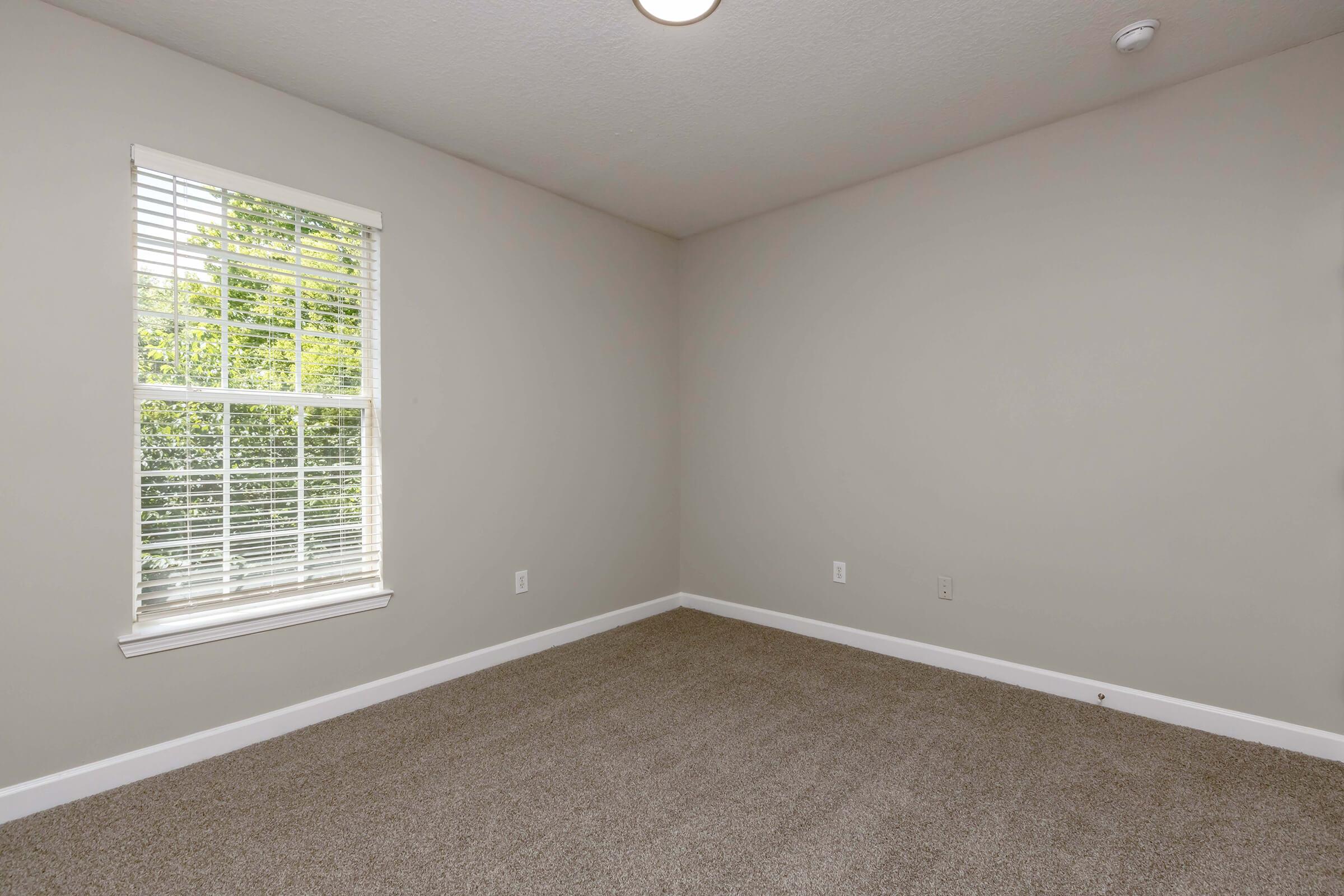 a room with a sink and a window