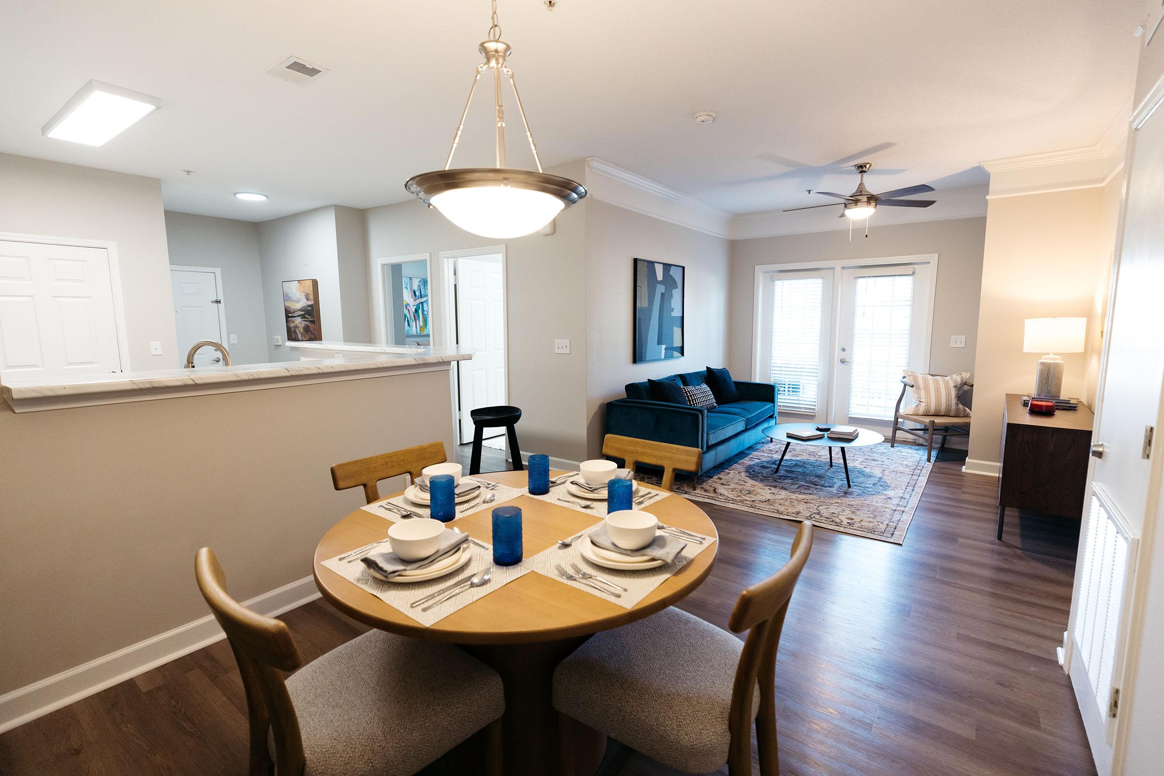 a kitchen with an island in the middle of a room