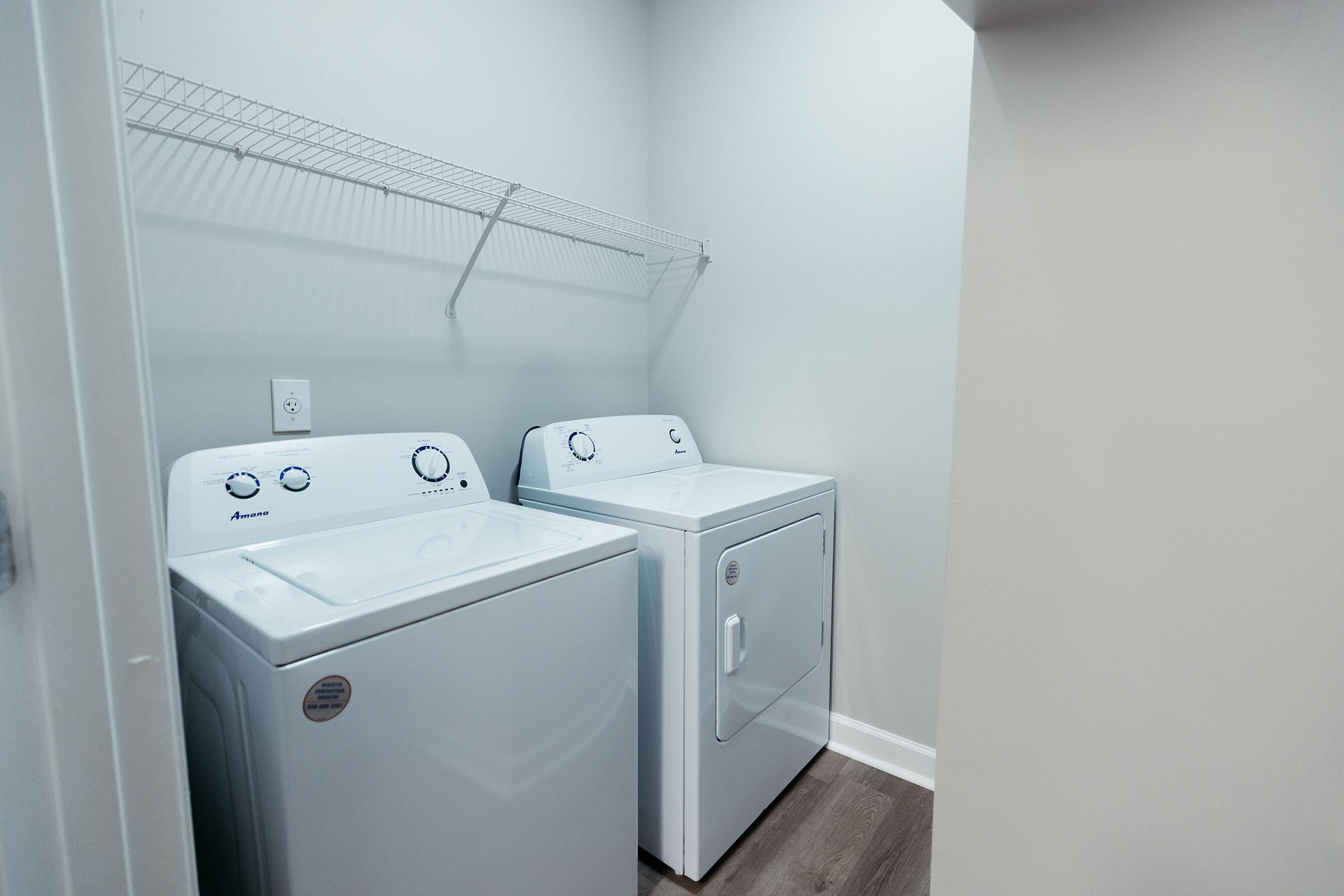 a refrigerator freezer sitting in a room