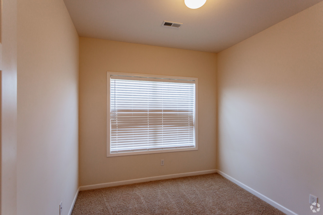 a room with a sink and a window