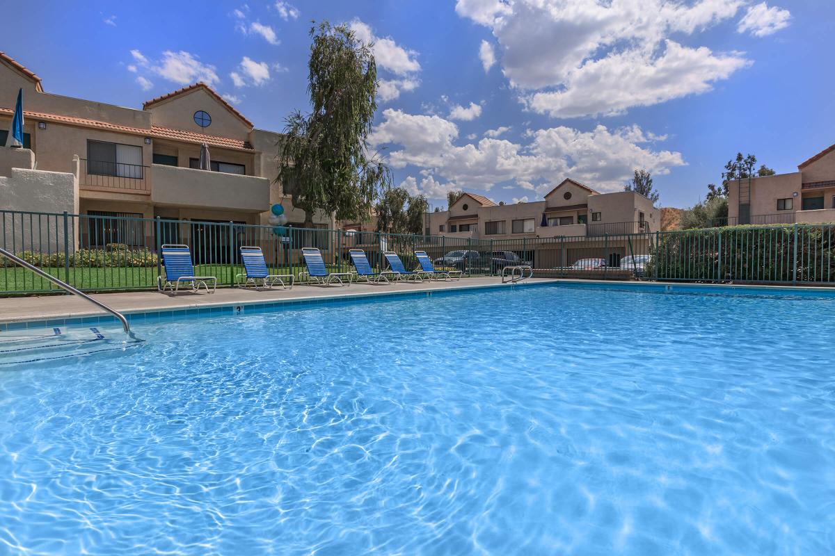 a pool next to a body of water