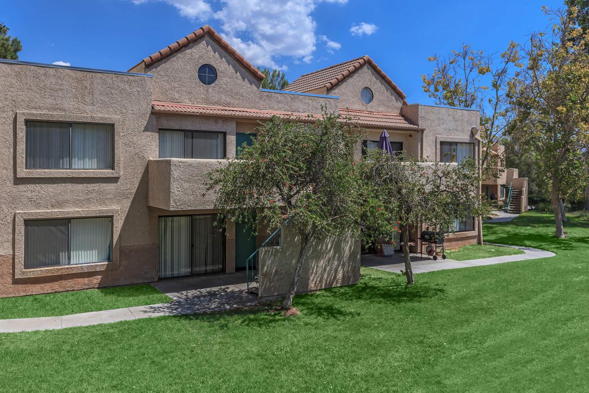 a large lawn in front of a house