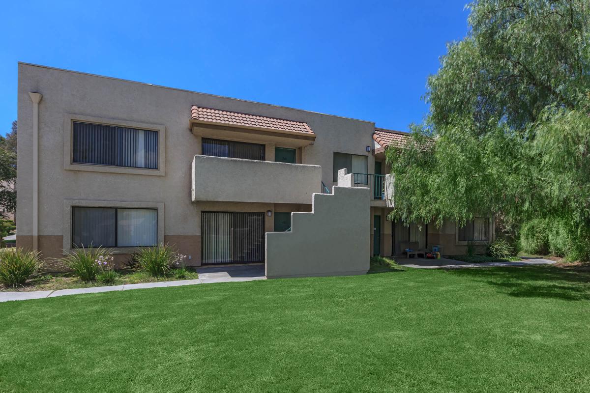 a large lawn in front of a house