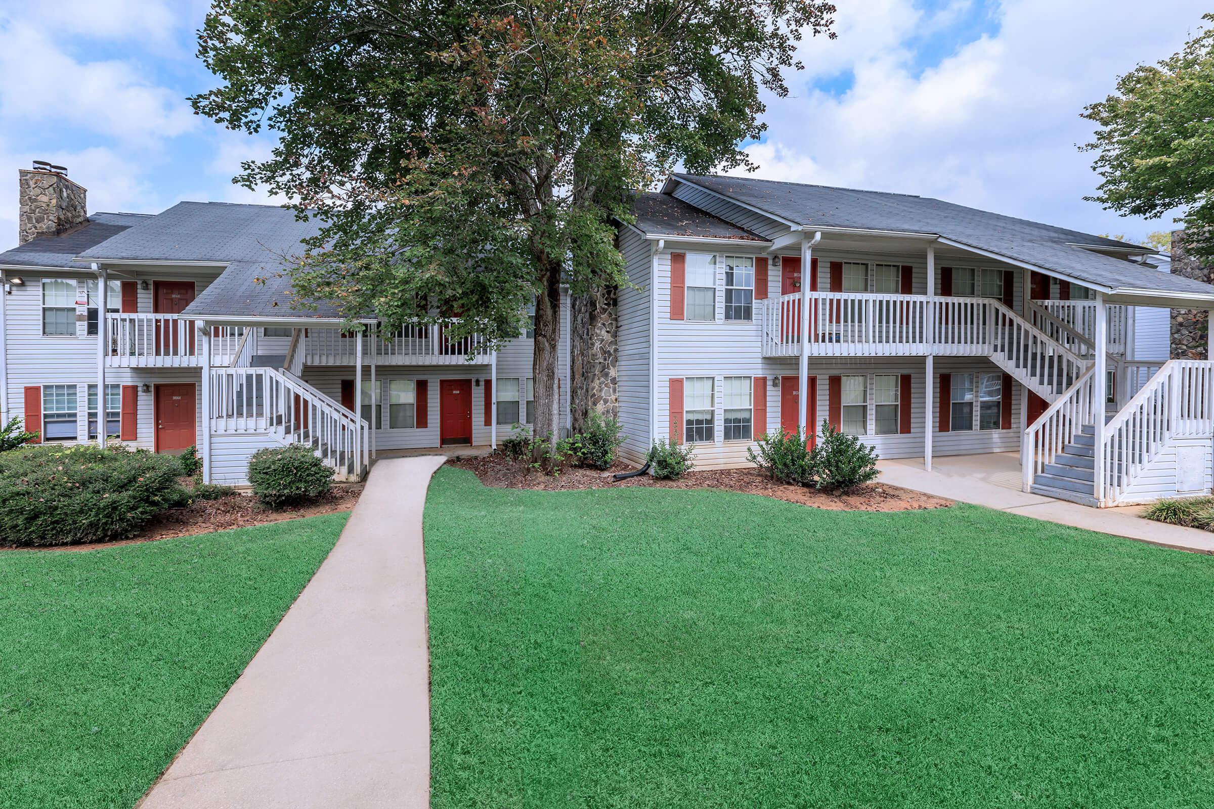 a large lawn in front of a house