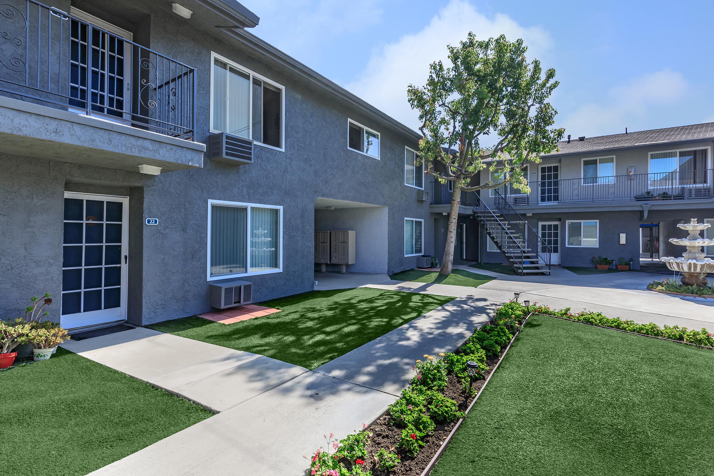 a large lawn in front of a house