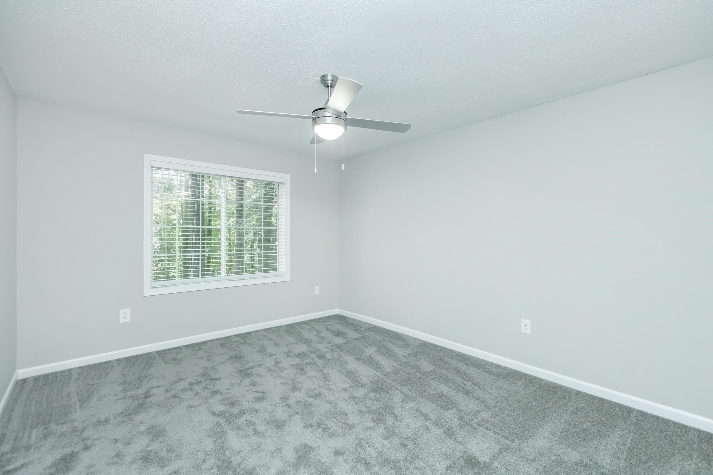 a room with a sink and a window