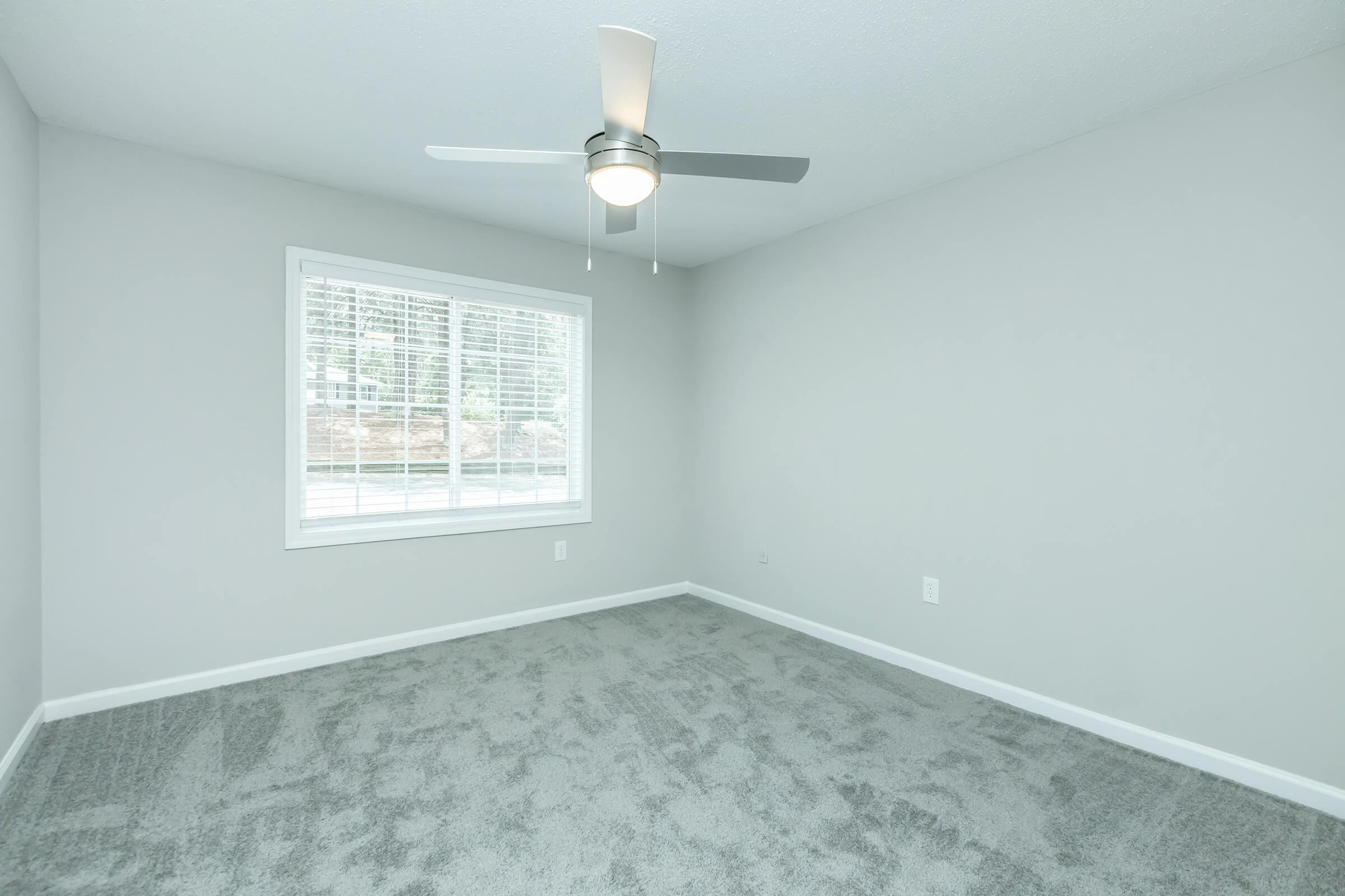 a room with a sink and a window