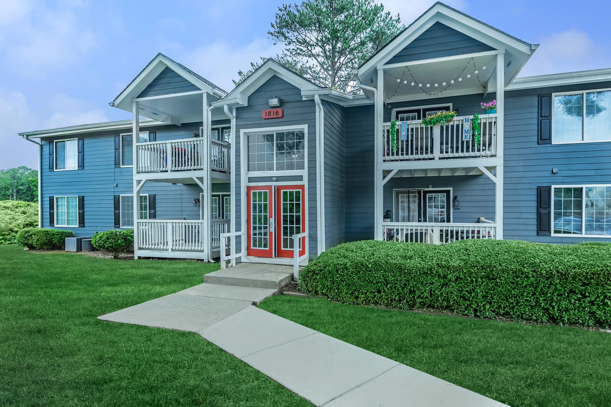 a large lawn in front of a house