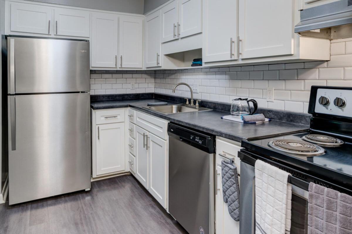 a kitchen with stainless steel appliances