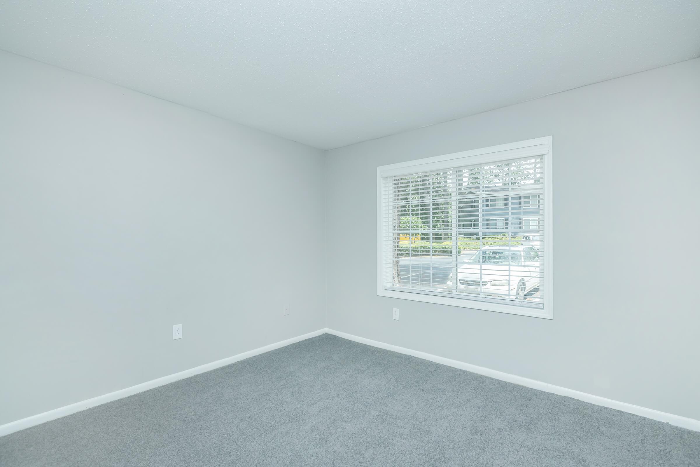 a room with a sink and a window