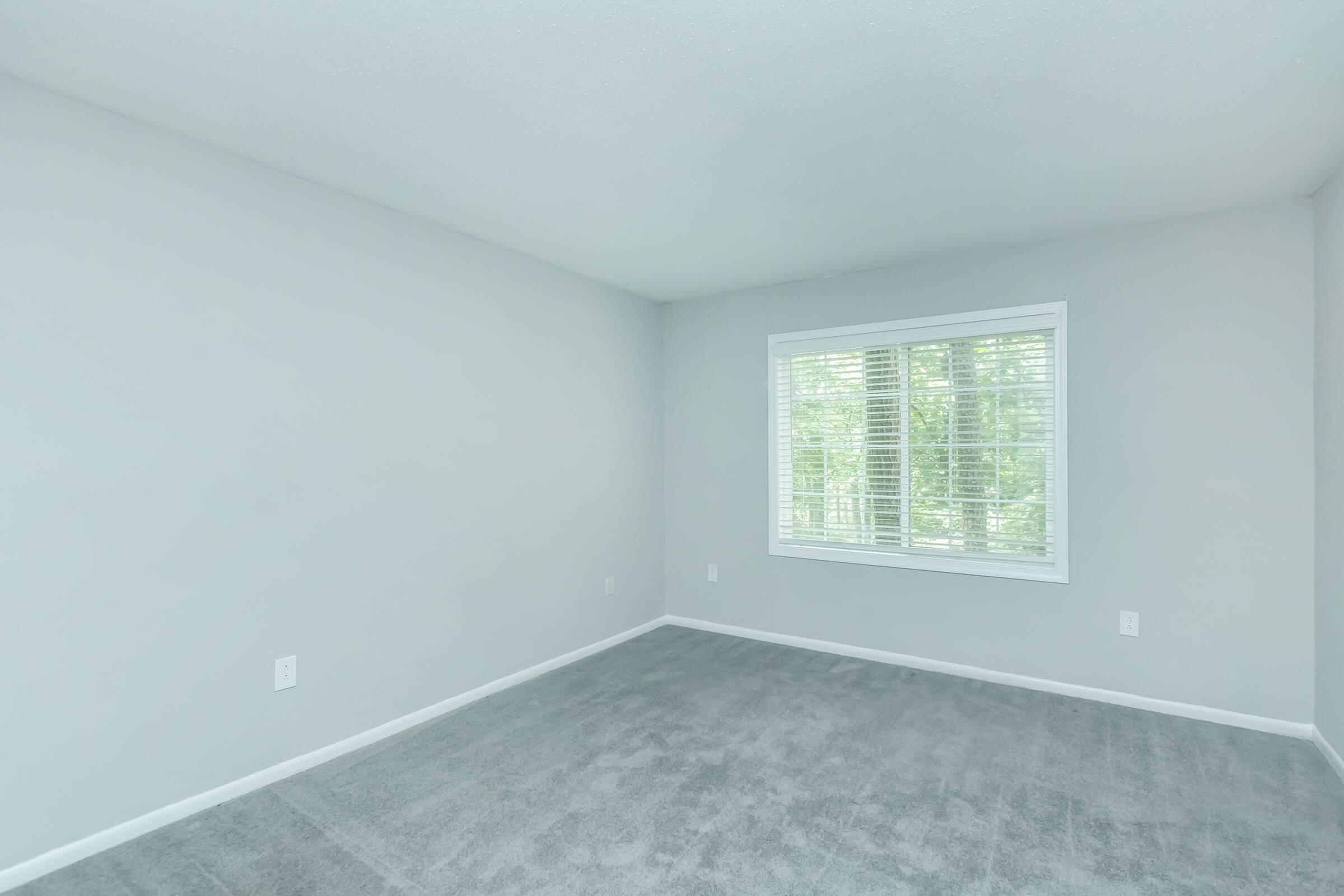 a room with a sink and a window