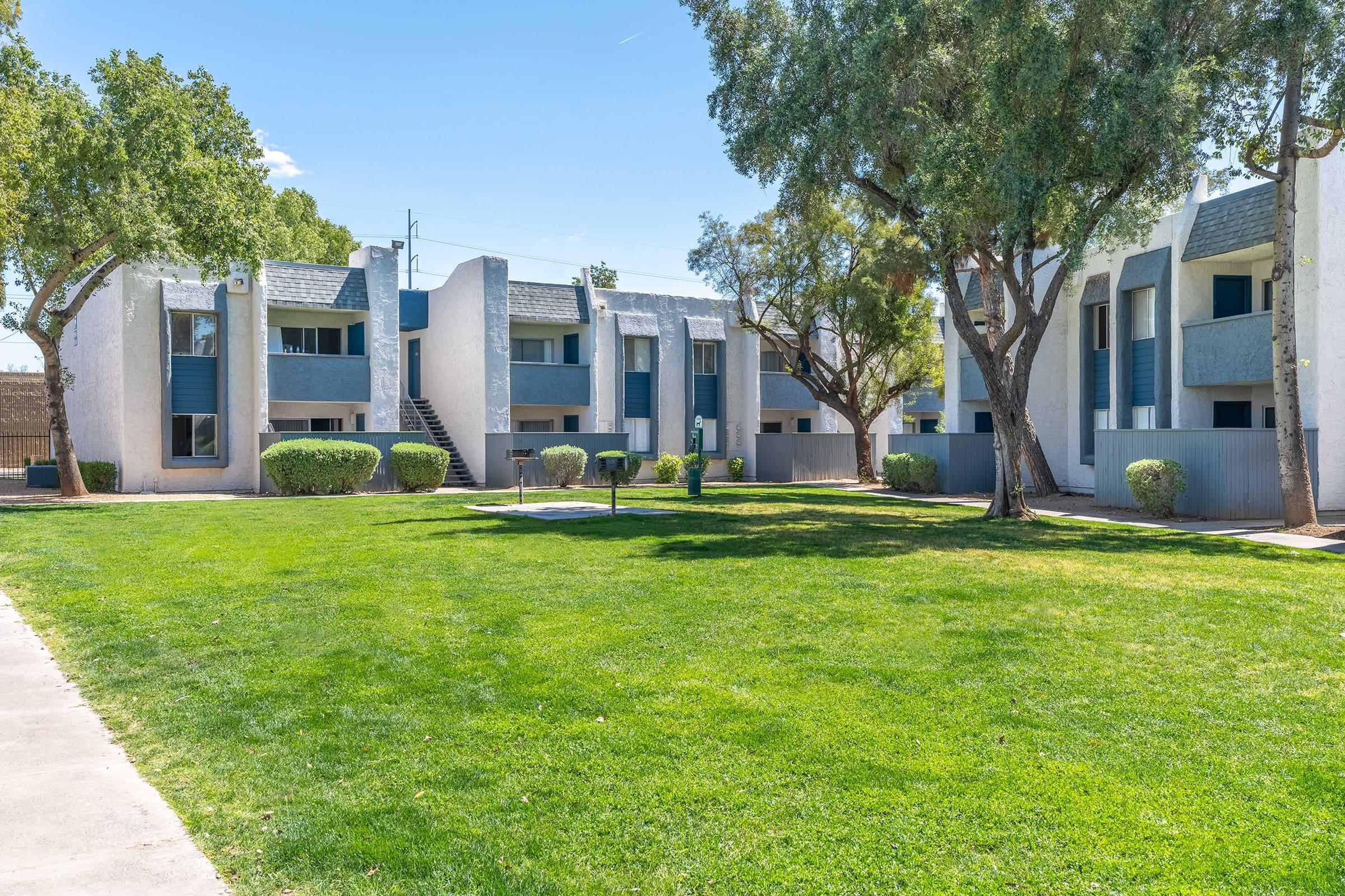 a large lawn in front of a building