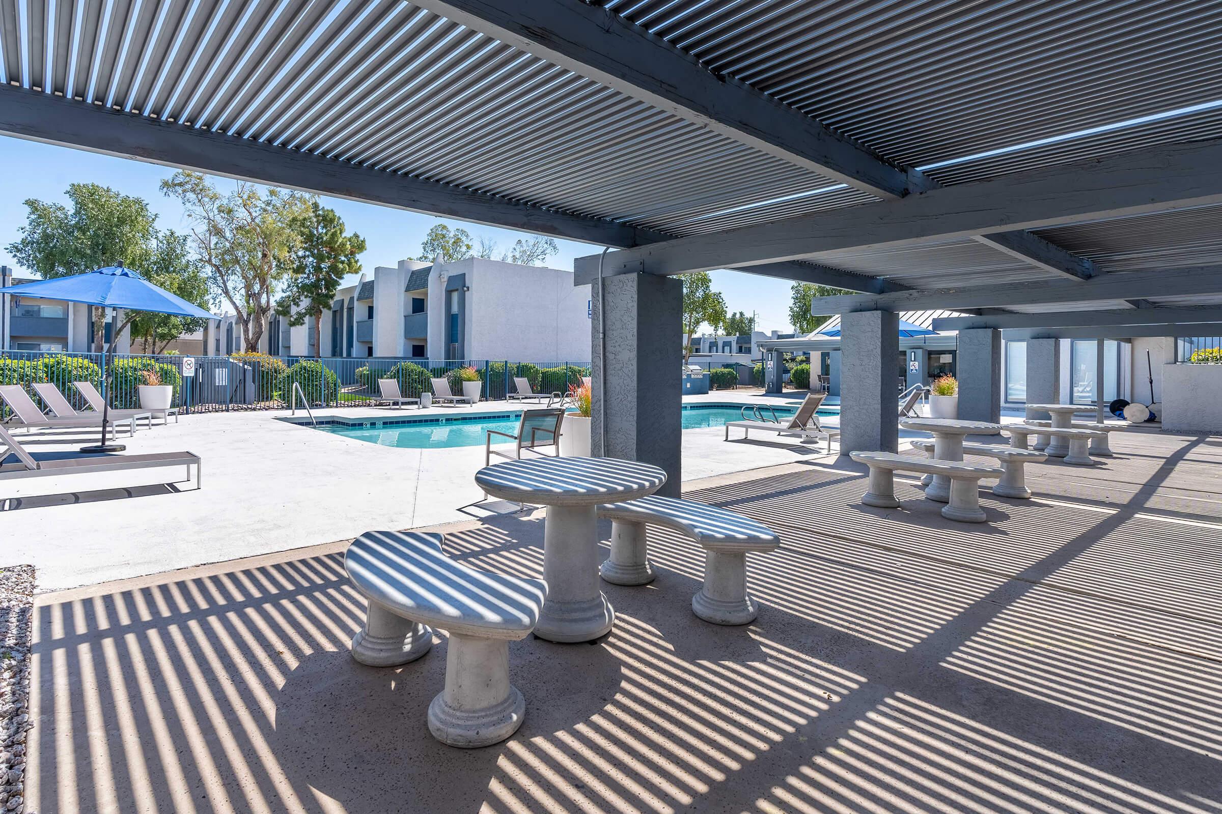 a building with a metal bench