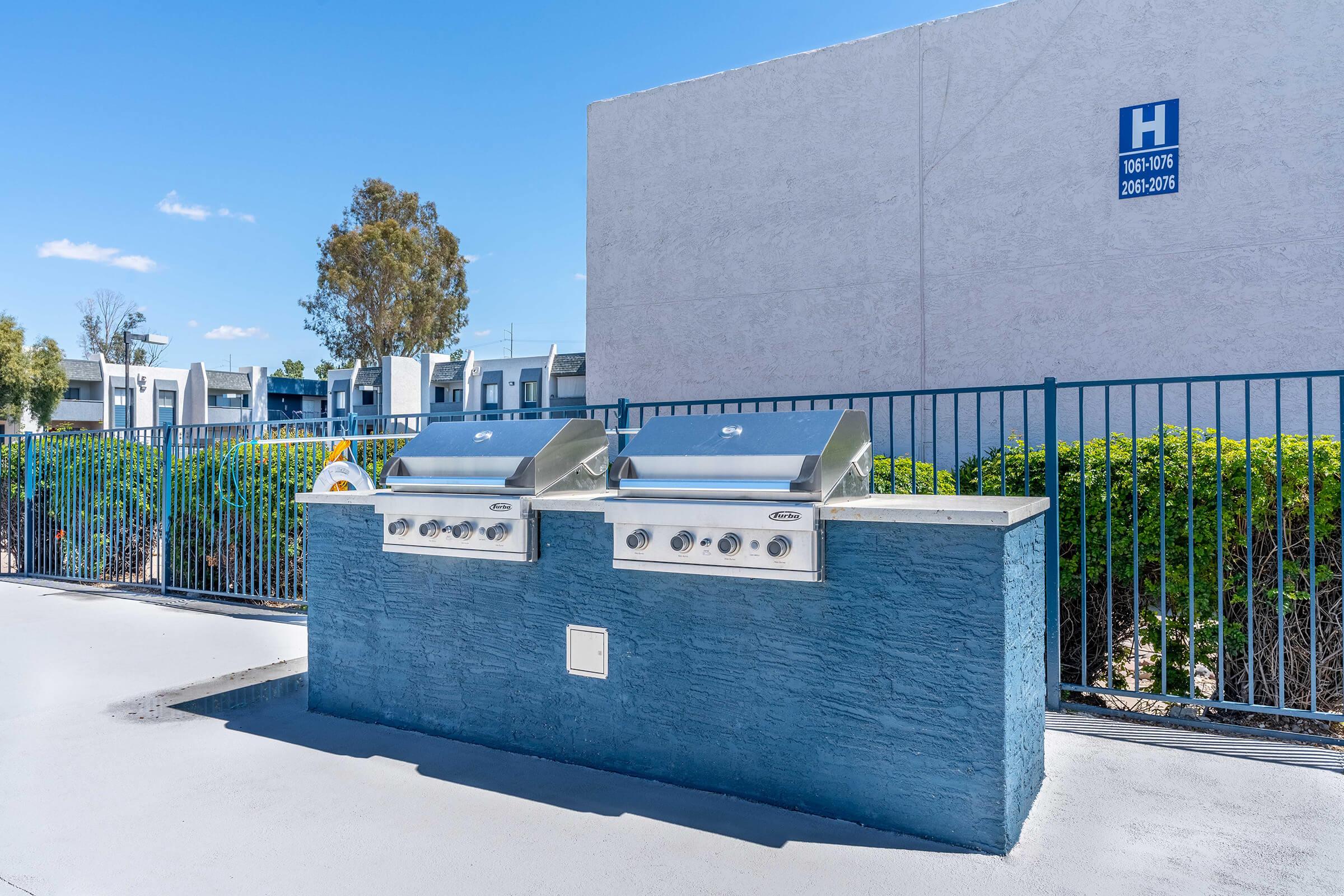 a building with a metal fence