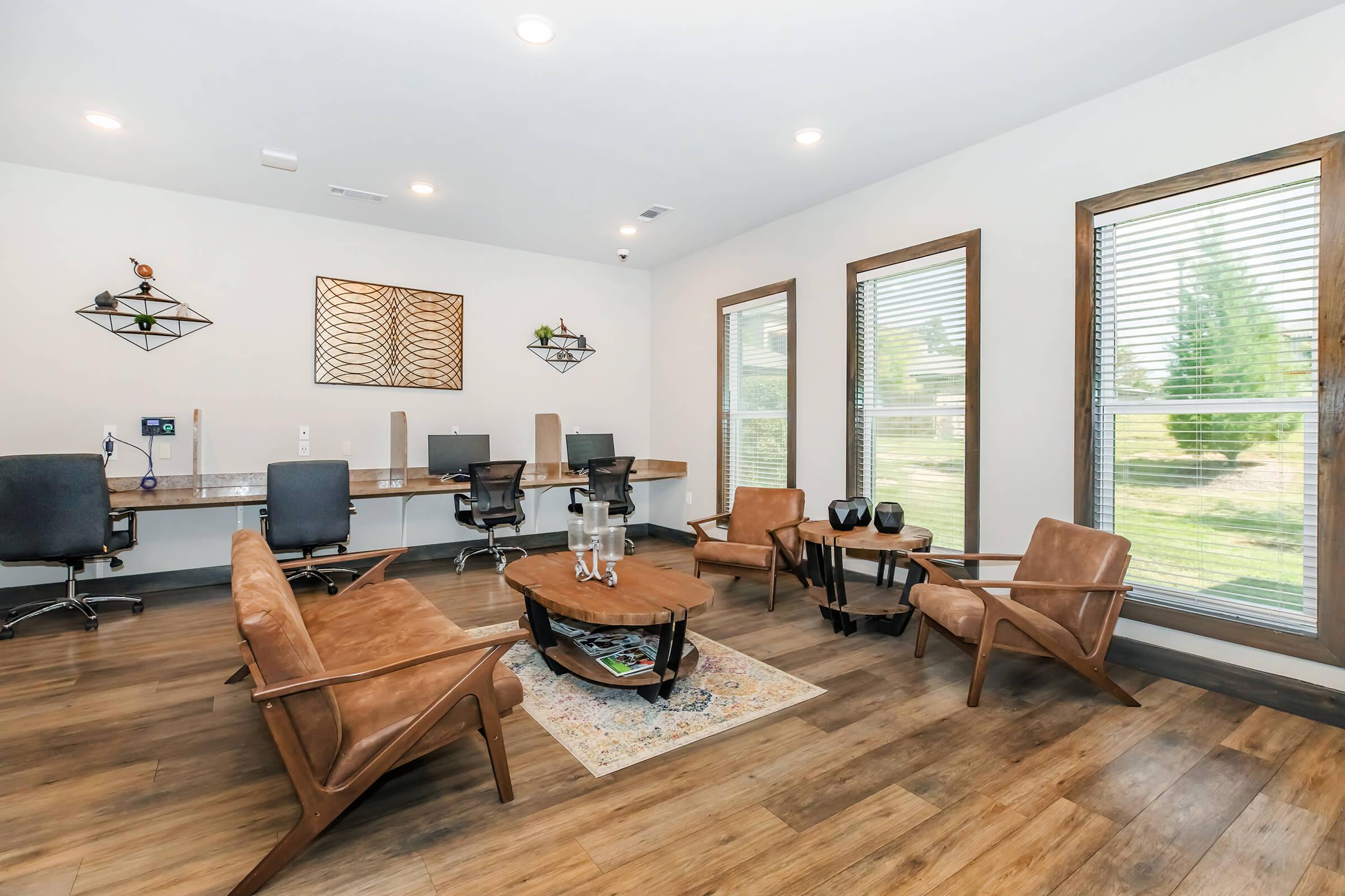 a living room filled with furniture and a fireplace