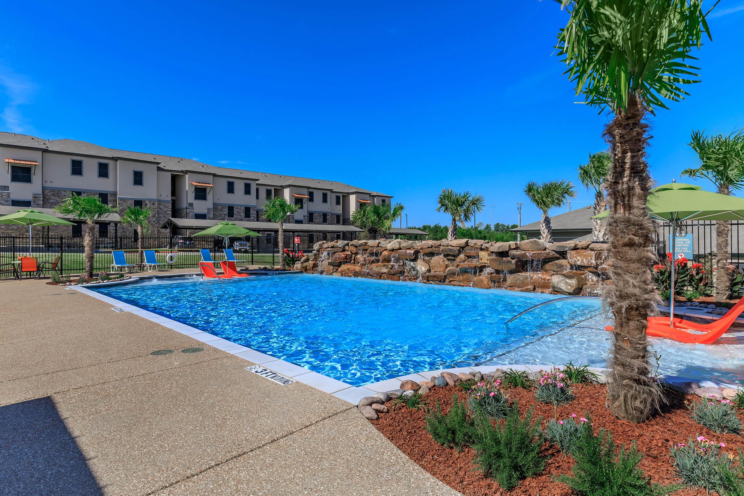 a pool next to a body of water