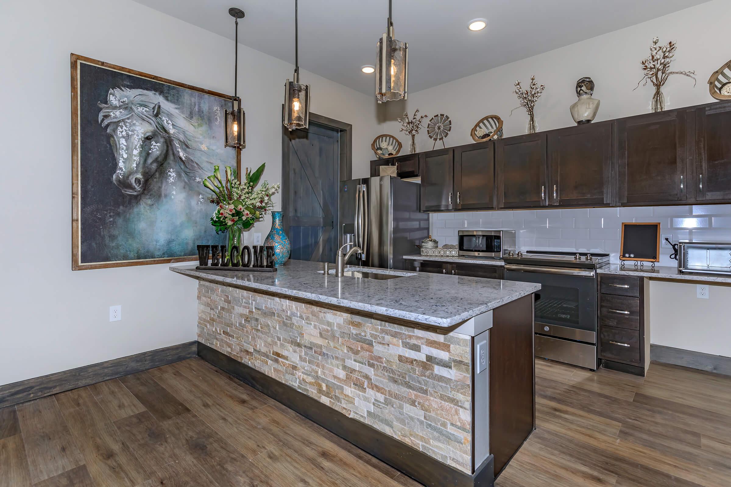 a kitchen with a building in the background