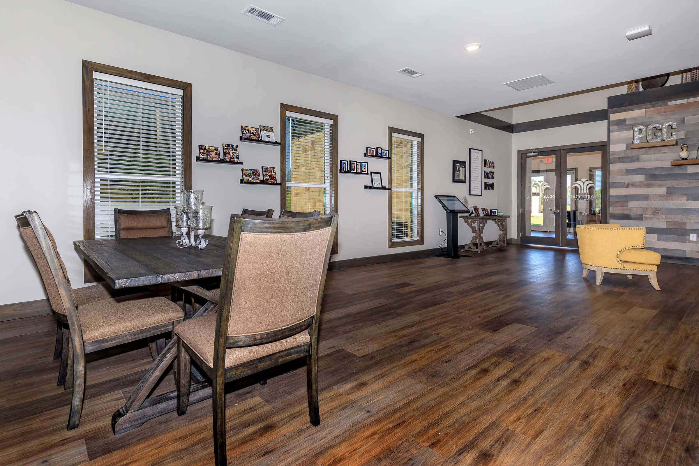 a living room filled with furniture and a fireplace