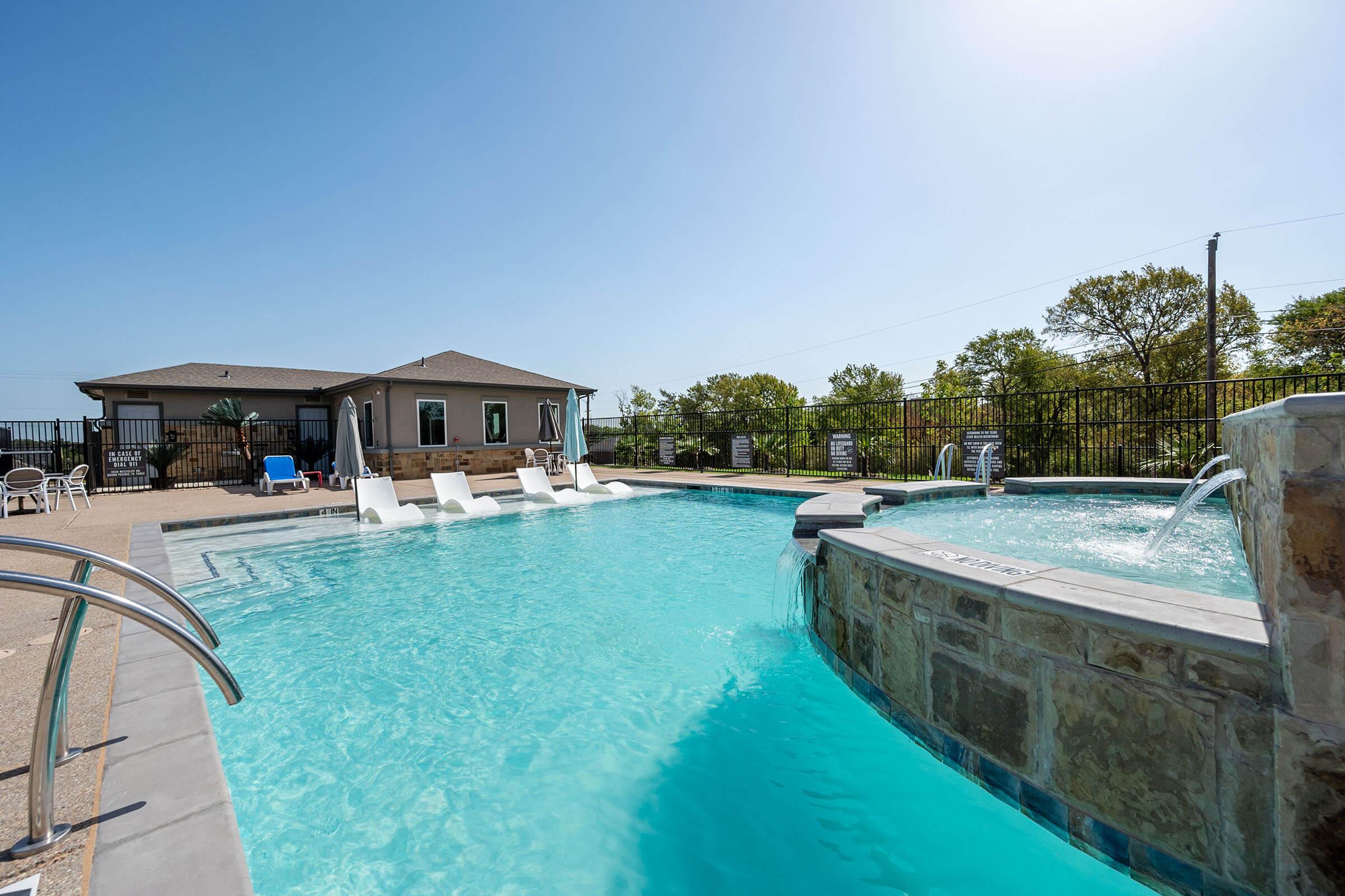 a pool next to a body of water