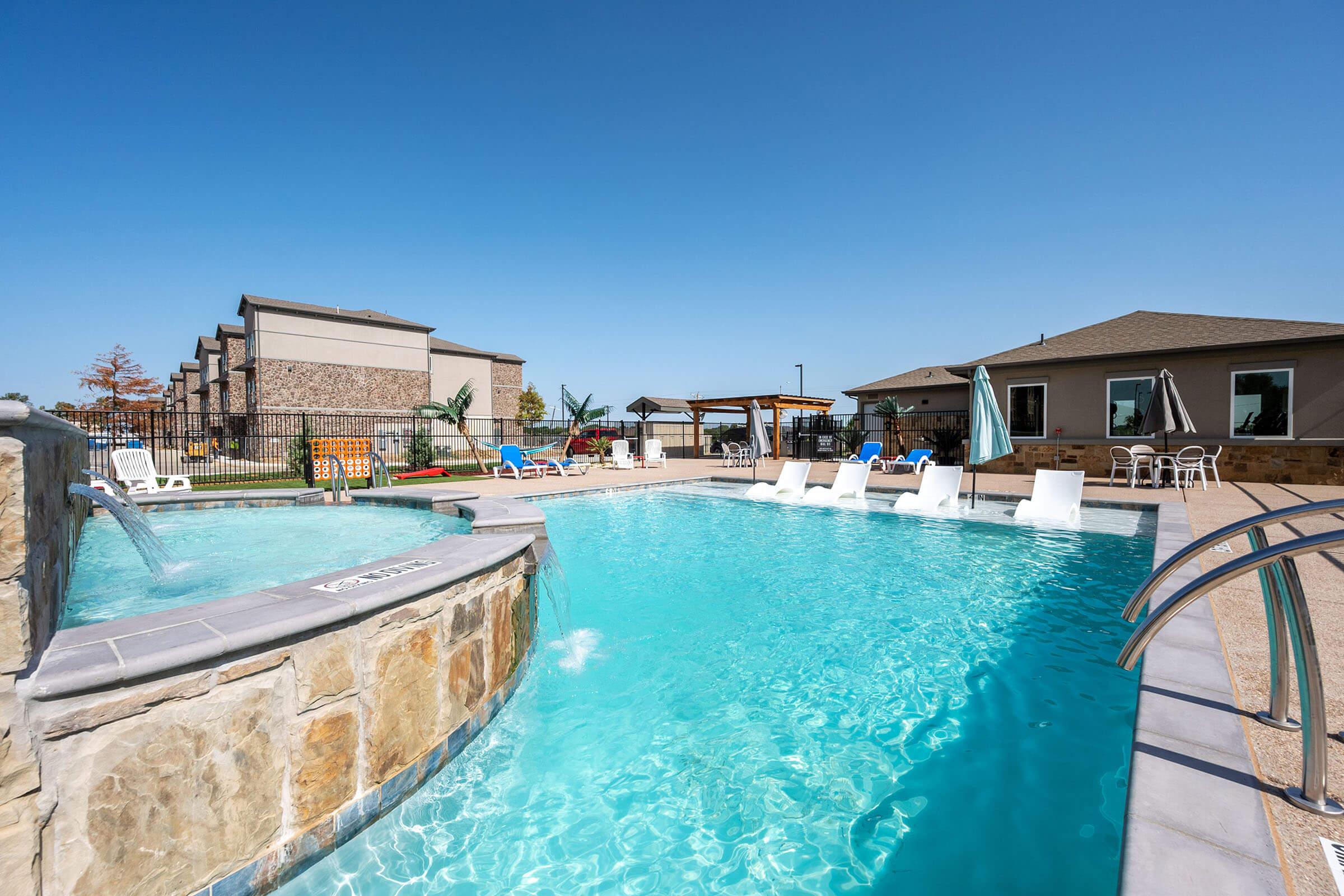 a pool next to a body of water