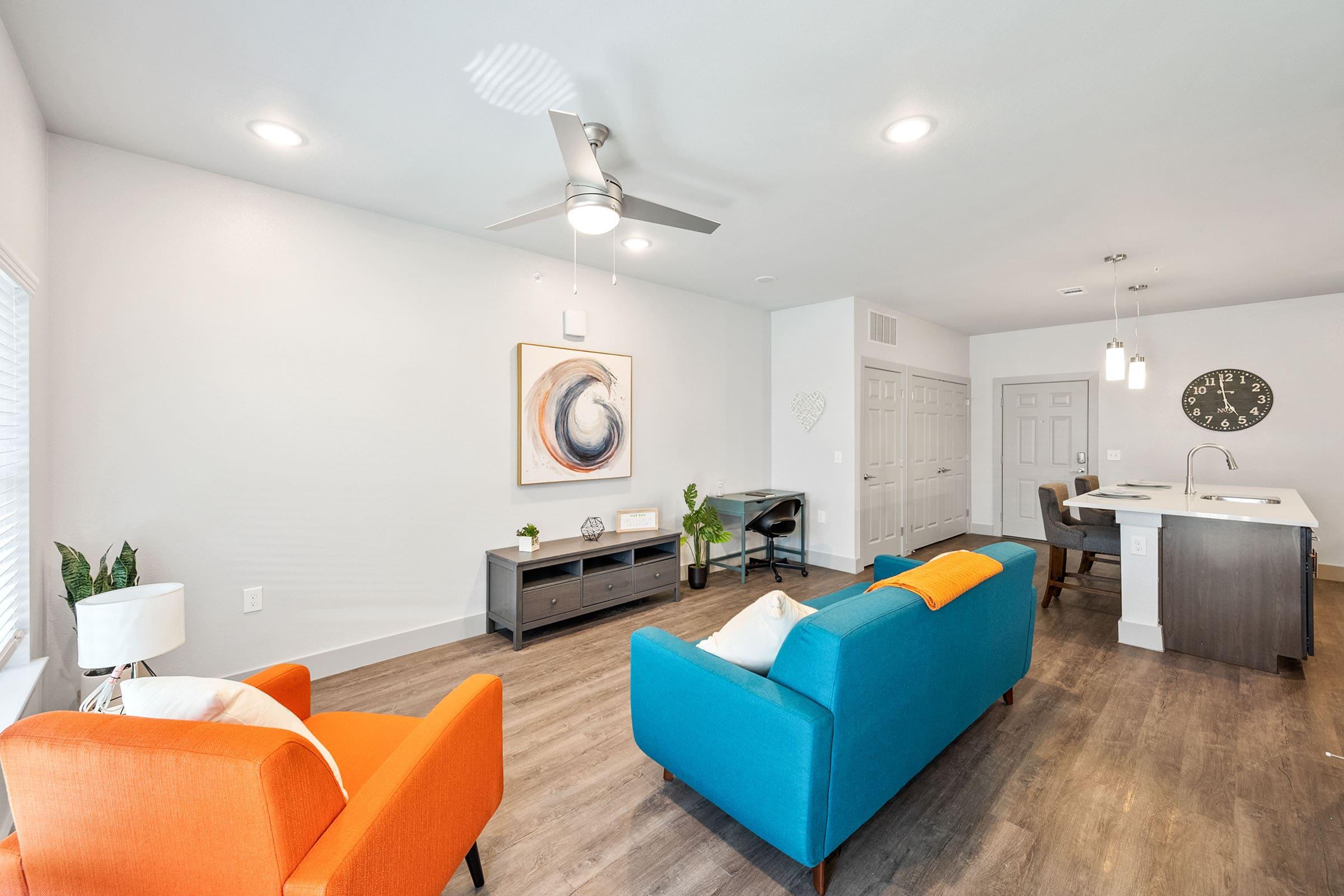 a living room filled with lots of furniture