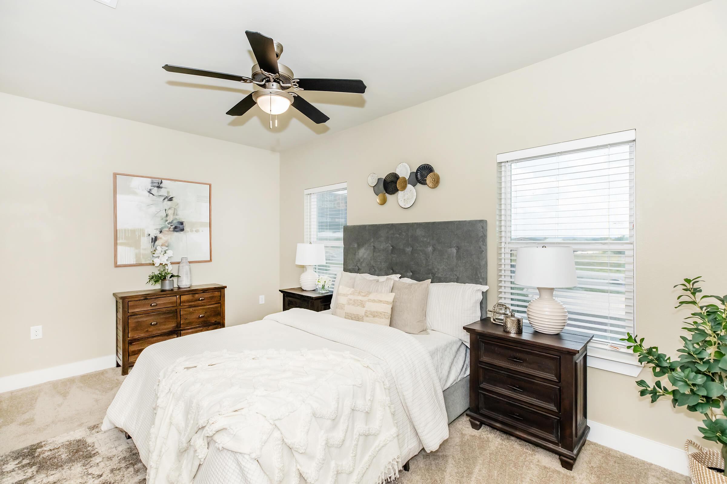 a bedroom with a large bed in a room