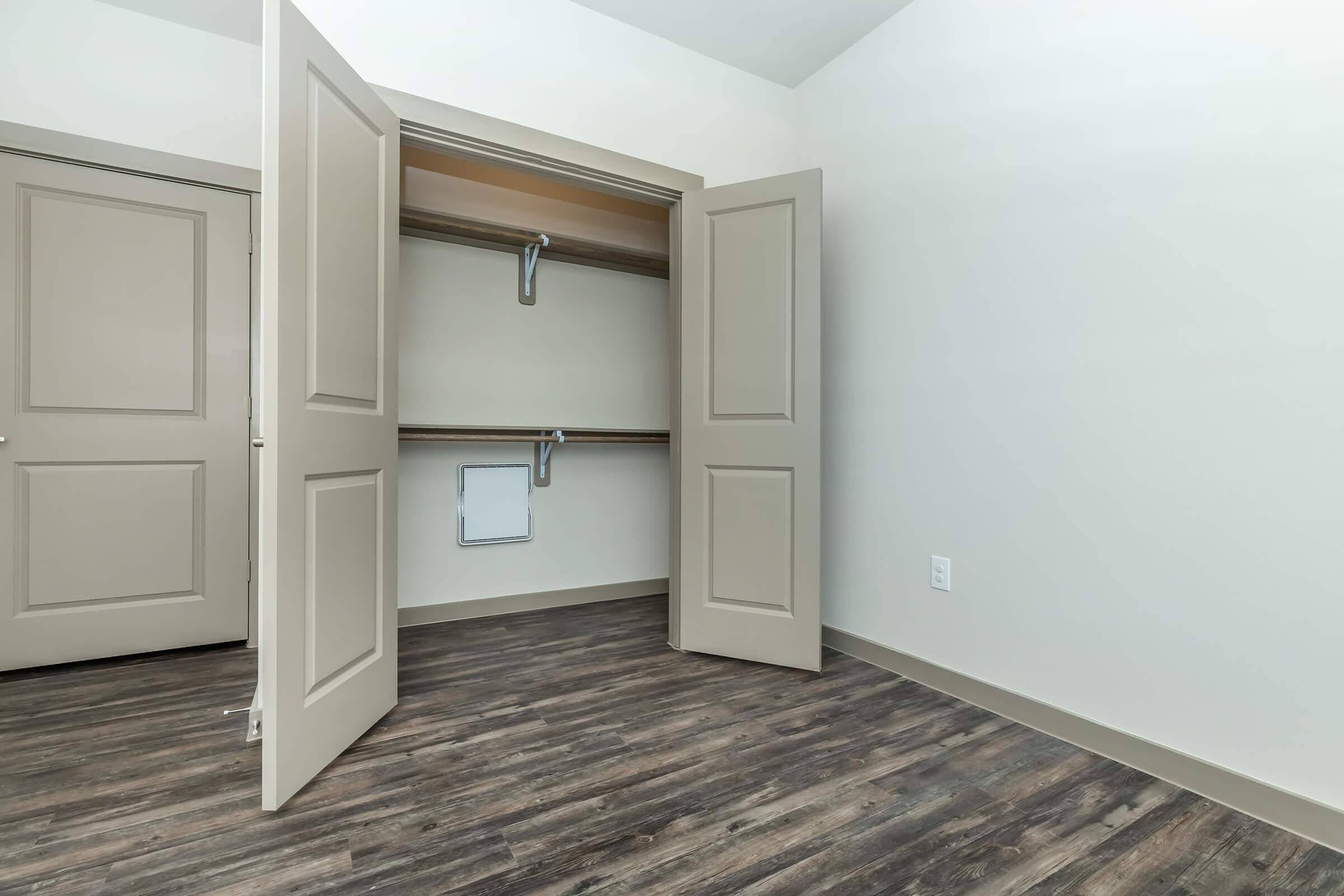 a kitchen with a wooden floor