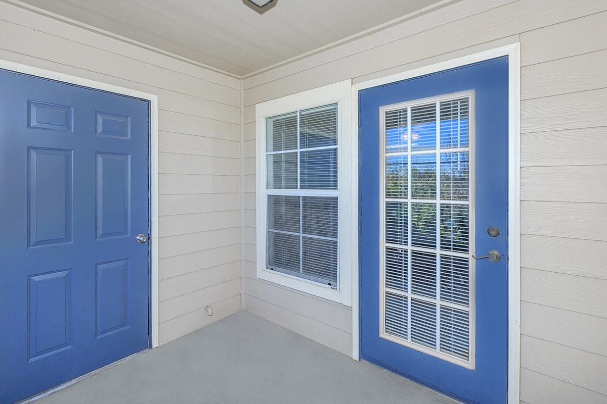 a door with a window in a room