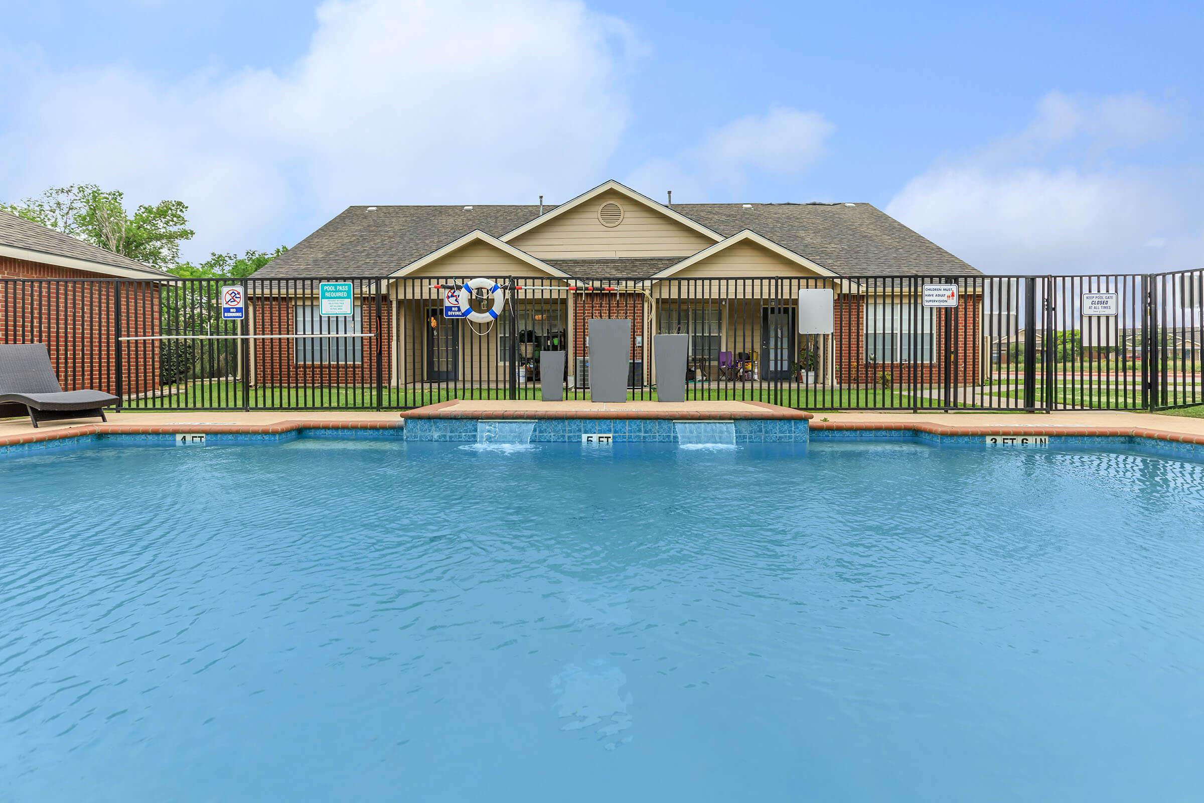 a small house in a pool of water