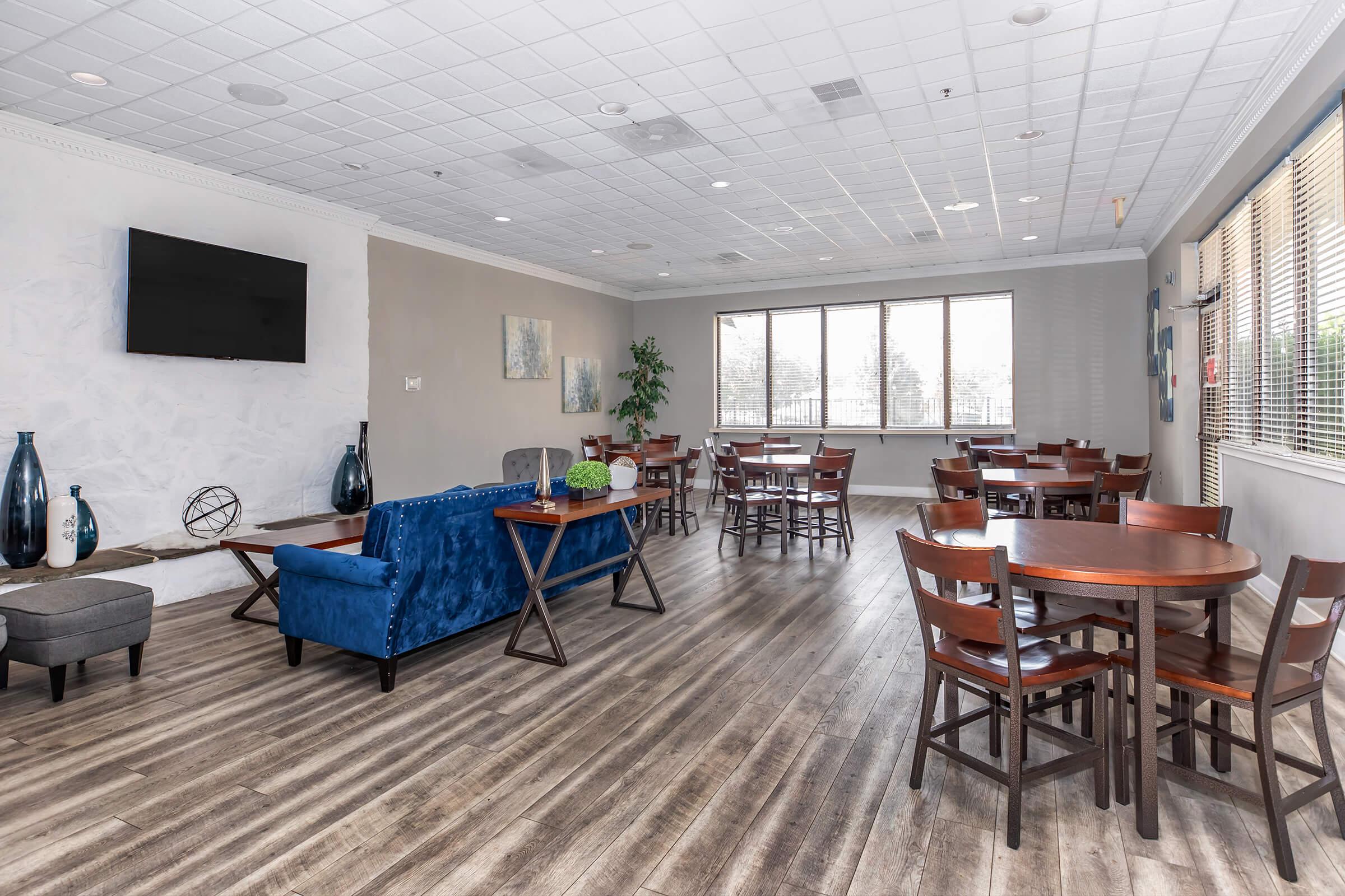 a room filled with furniture on top of a wooden chair