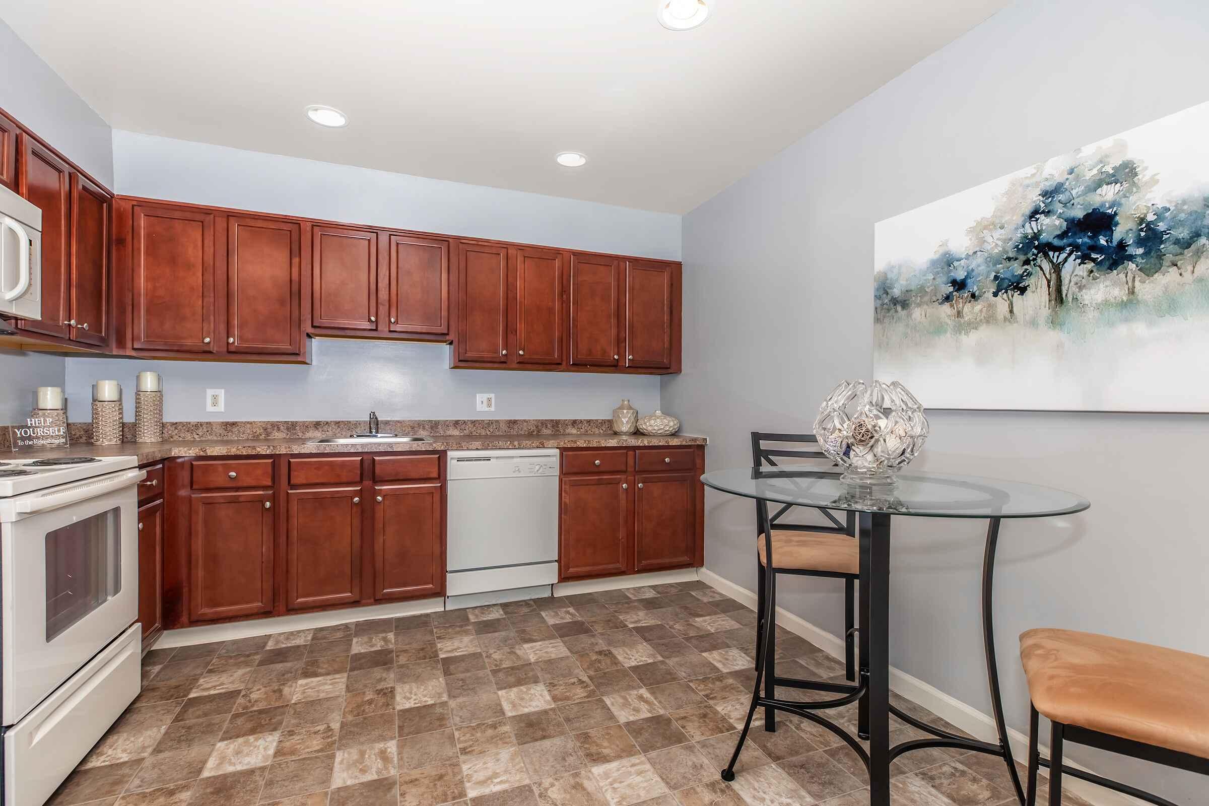 a kitchen with a wood floor