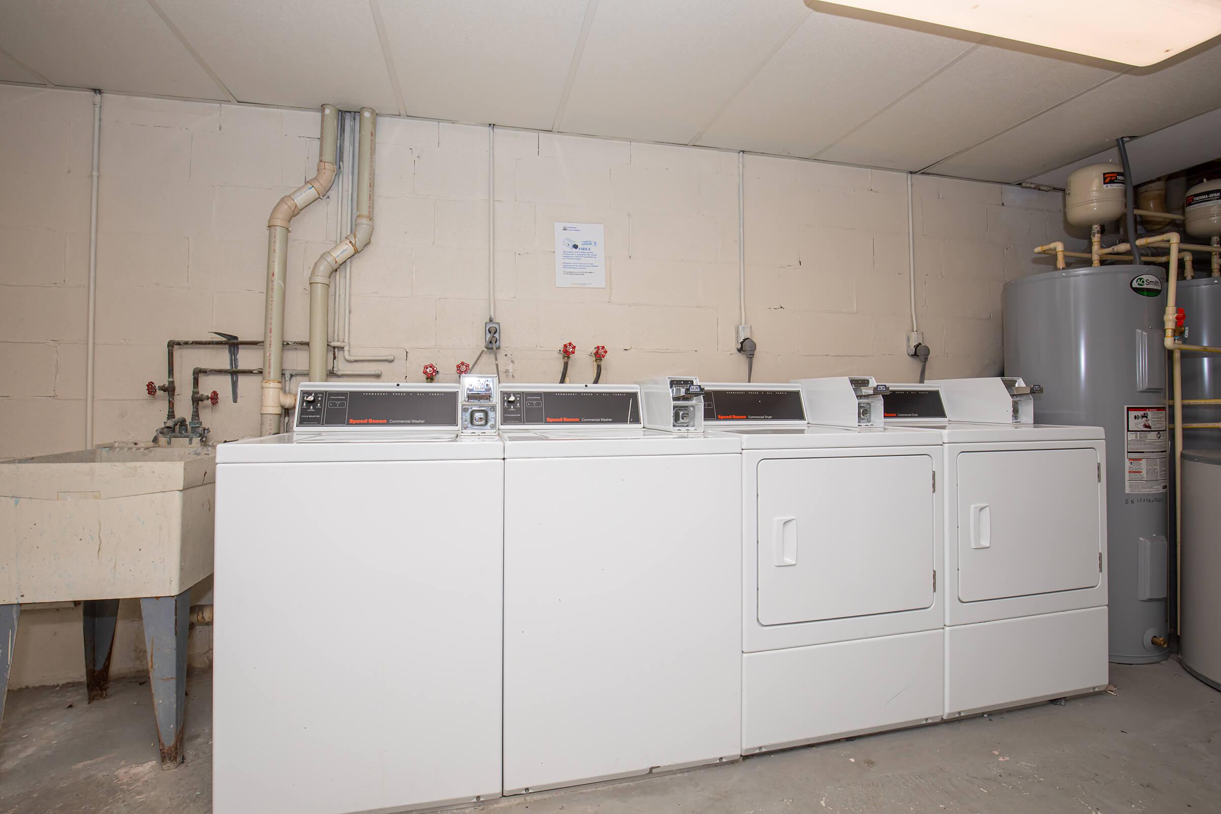 a kitchen with a stove and a refrigerator