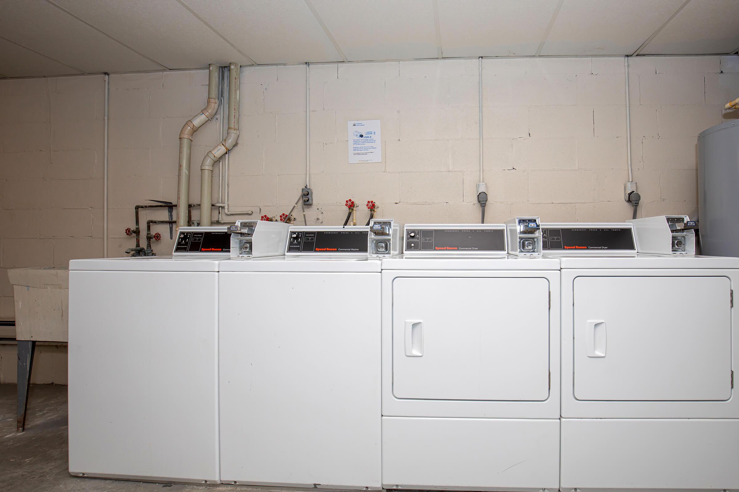 a kitchen with a stove top oven sitting inside of a refrigerator