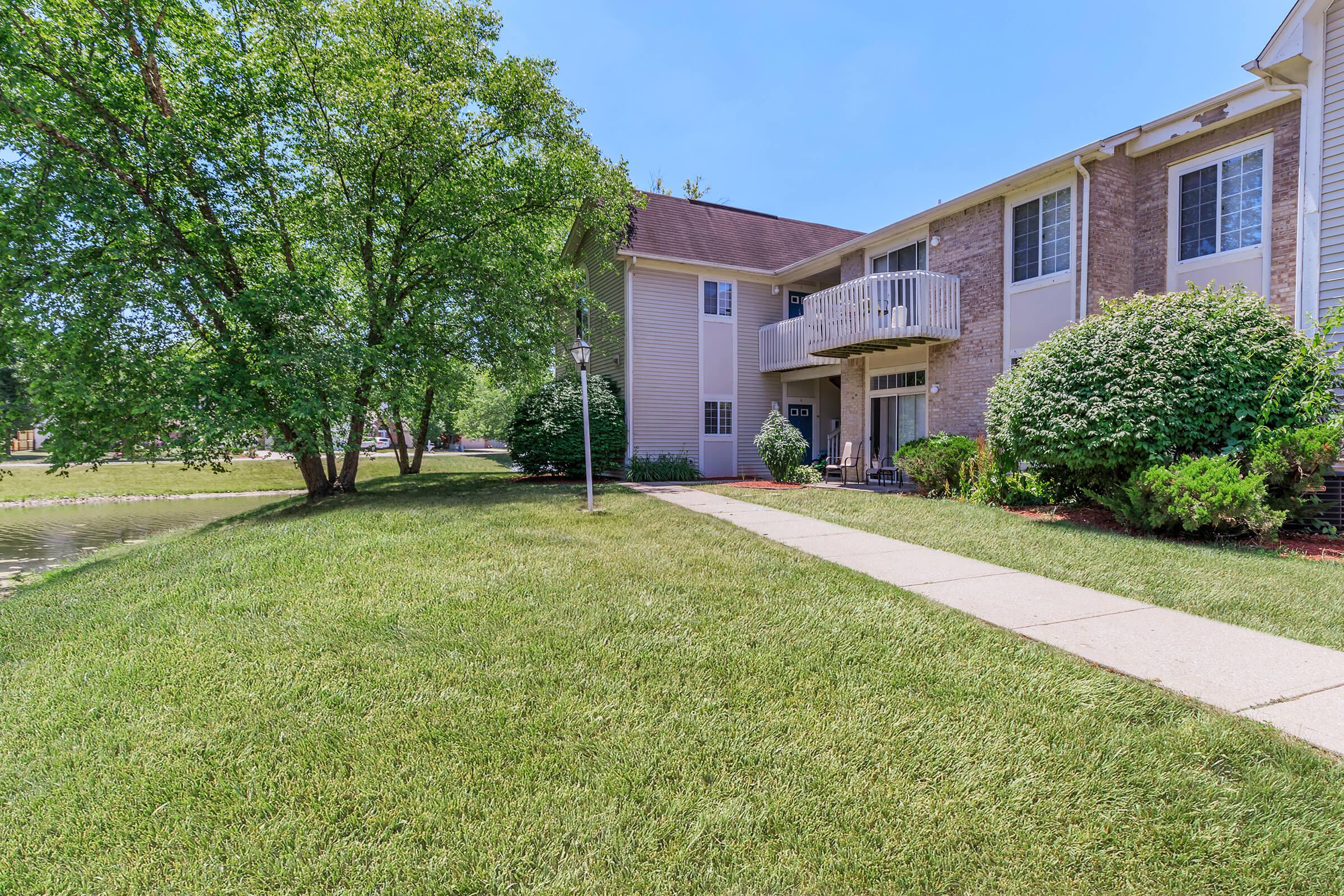 a large lawn in front of a house